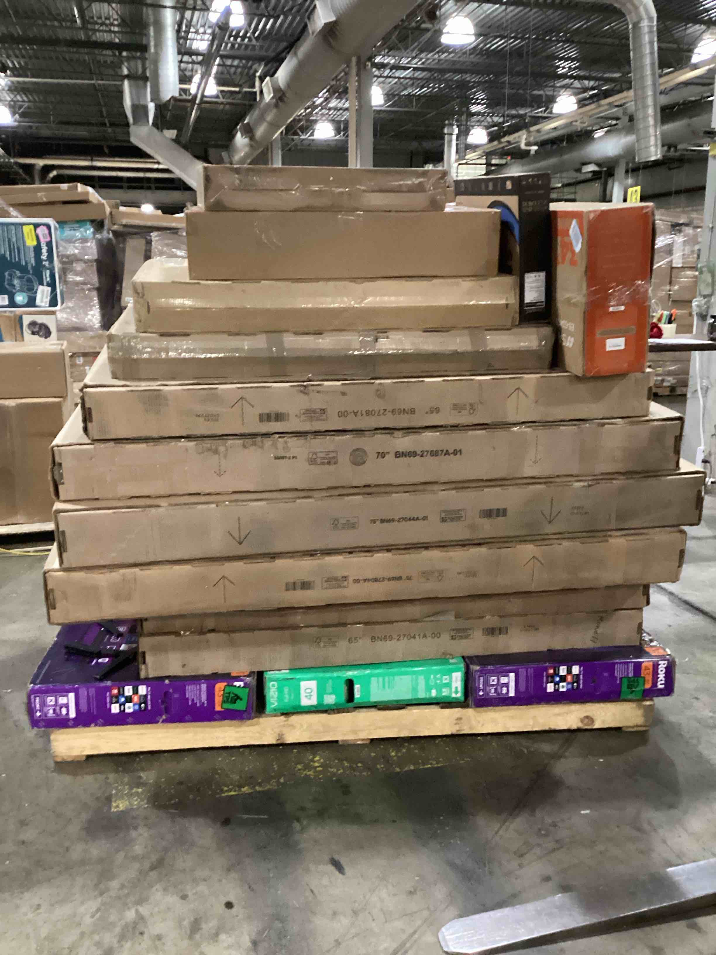 Condition photo showing As Is for pallet of defective electronics for parts 