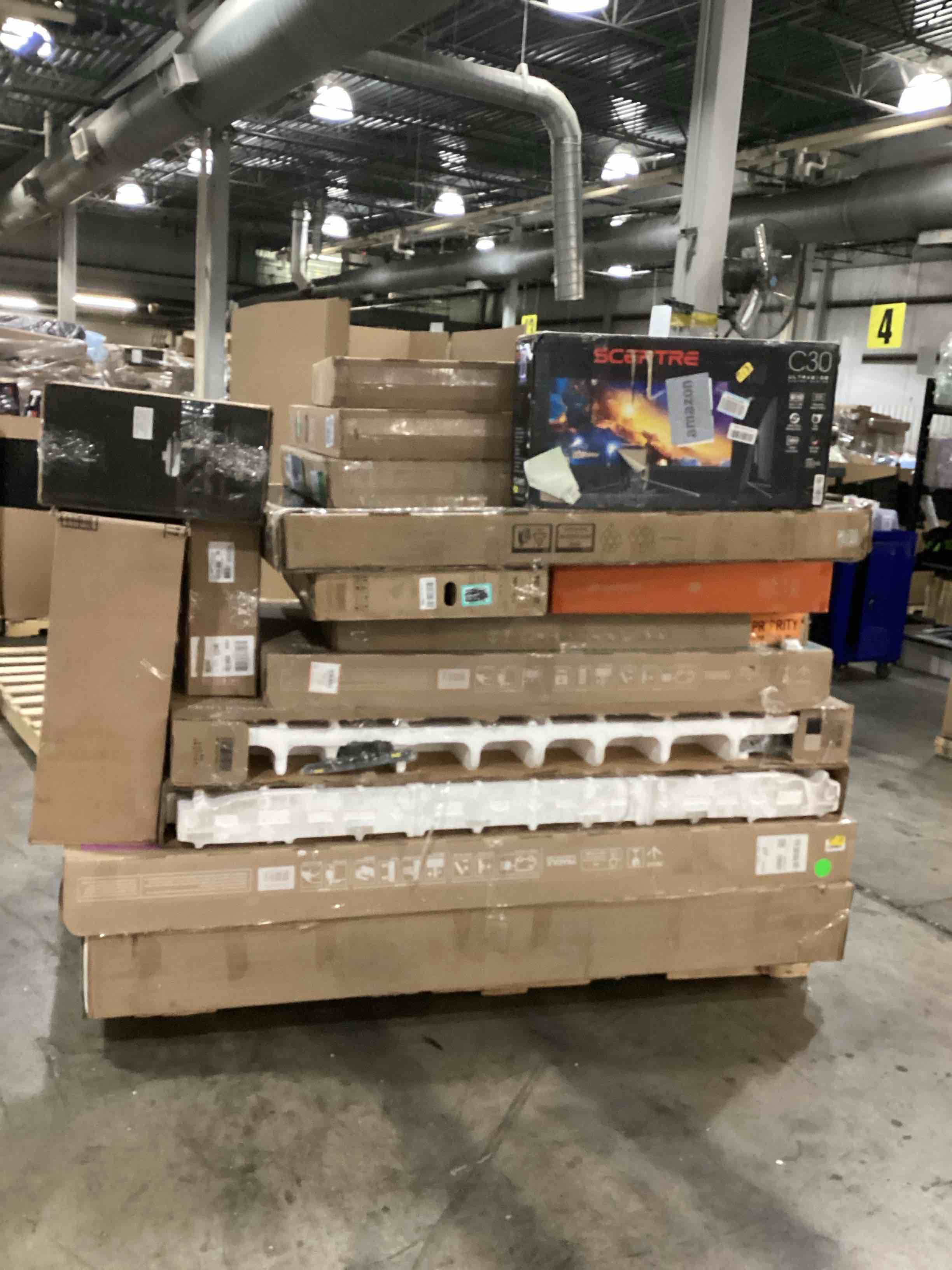 Condition photo showing As Is for pallet of defective electronics for parts 