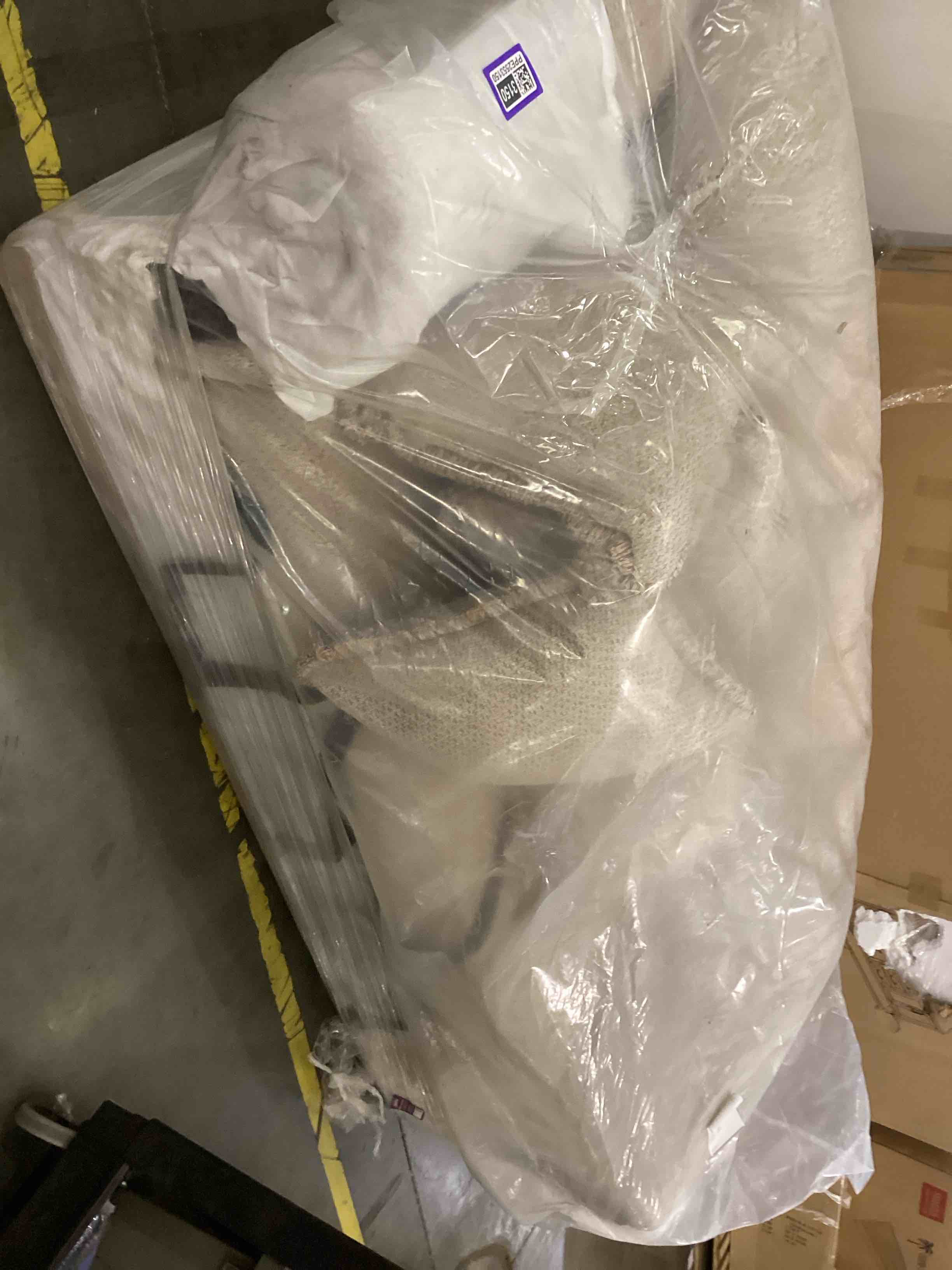 grey sofa with pillows