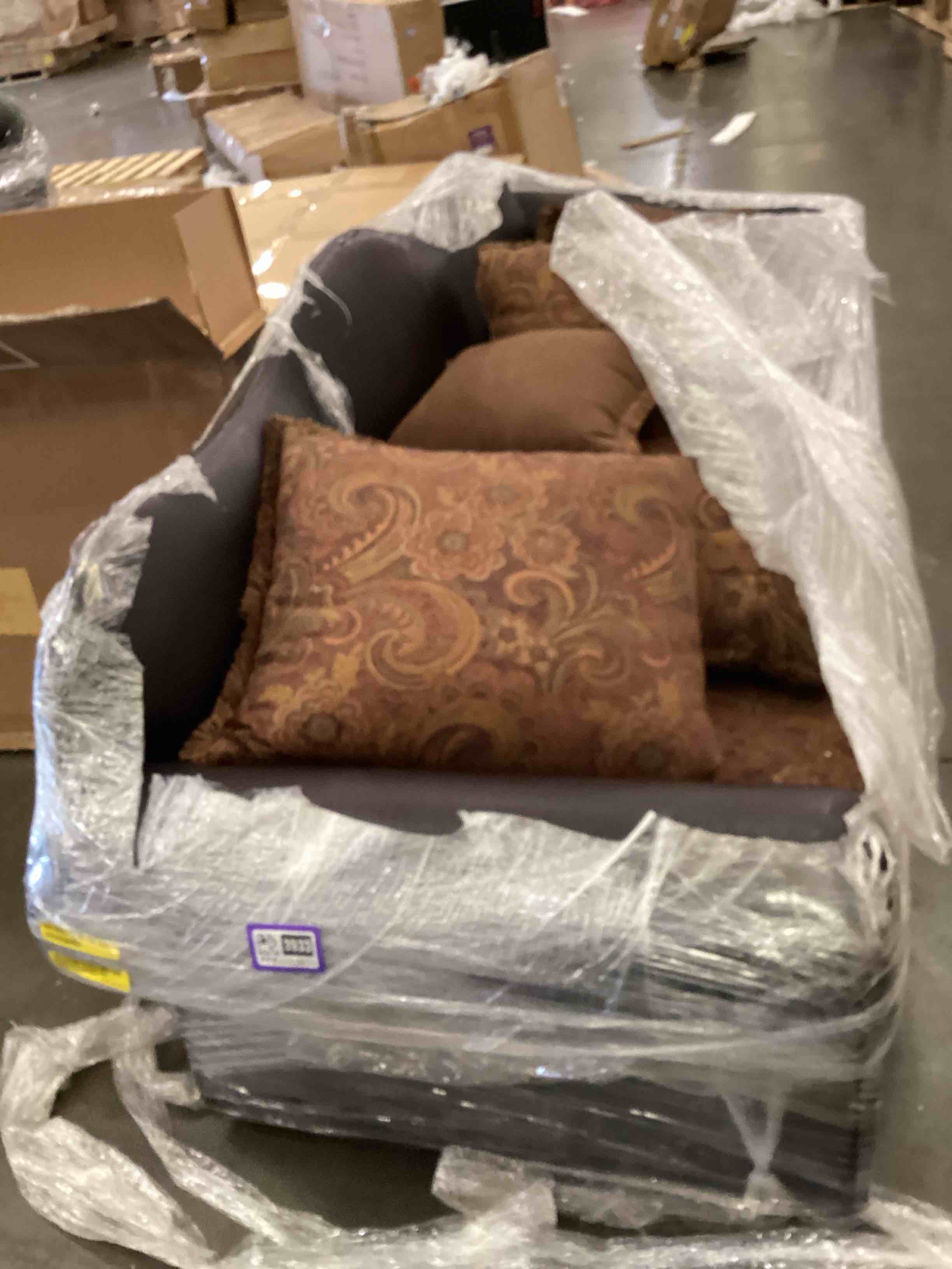 leather sofa with pillows