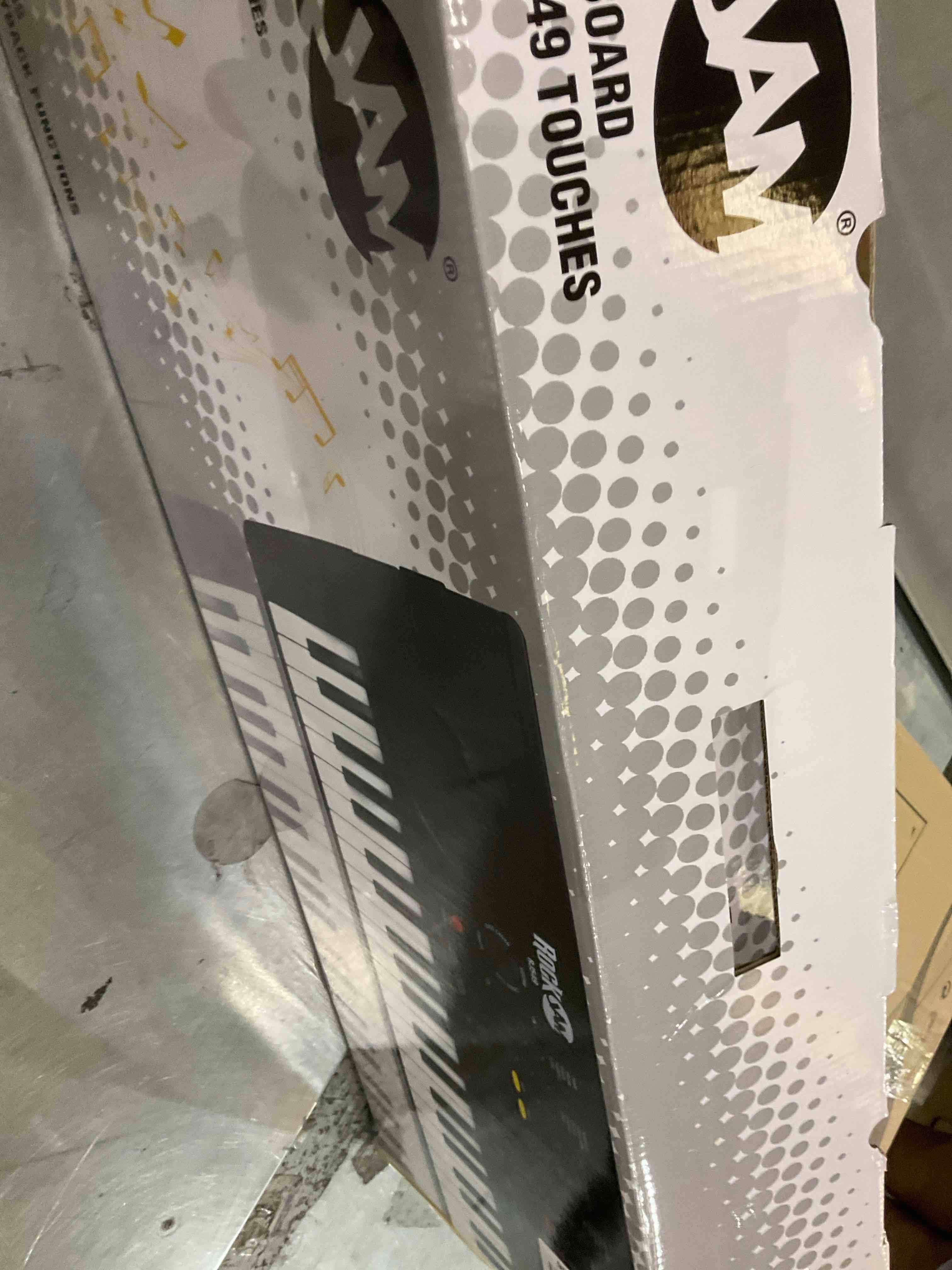 RockJam 49 Key Keyboard Piano with Power Supply, Sheet Music Stand, Piano Note Stickers & Simply Piano Lessons, Black