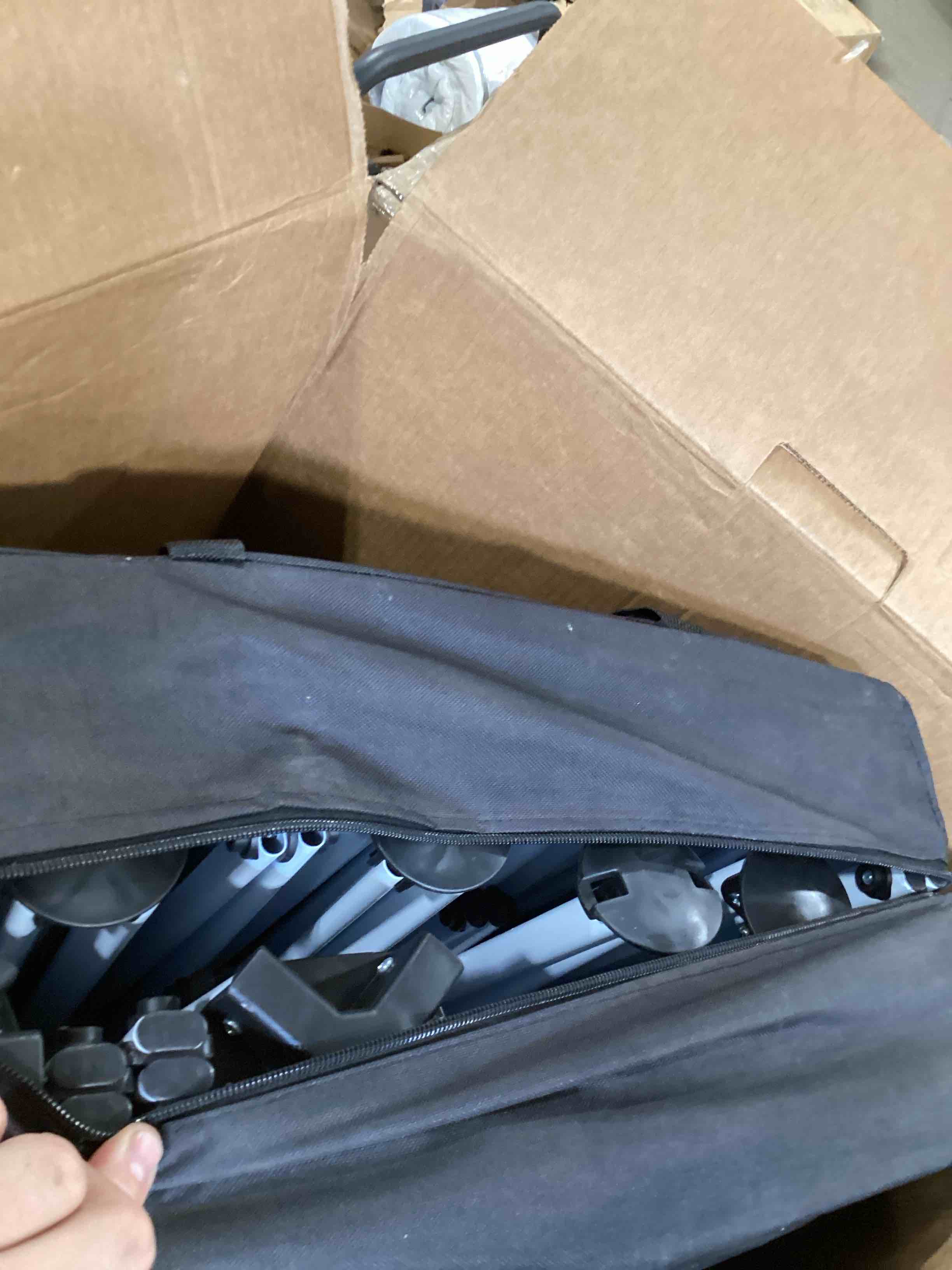 Condition photo showing As Is for INCOMPLETE Heavy Duty 30 Ft. W x 10 Ft. D Steel Pop-up Canopy