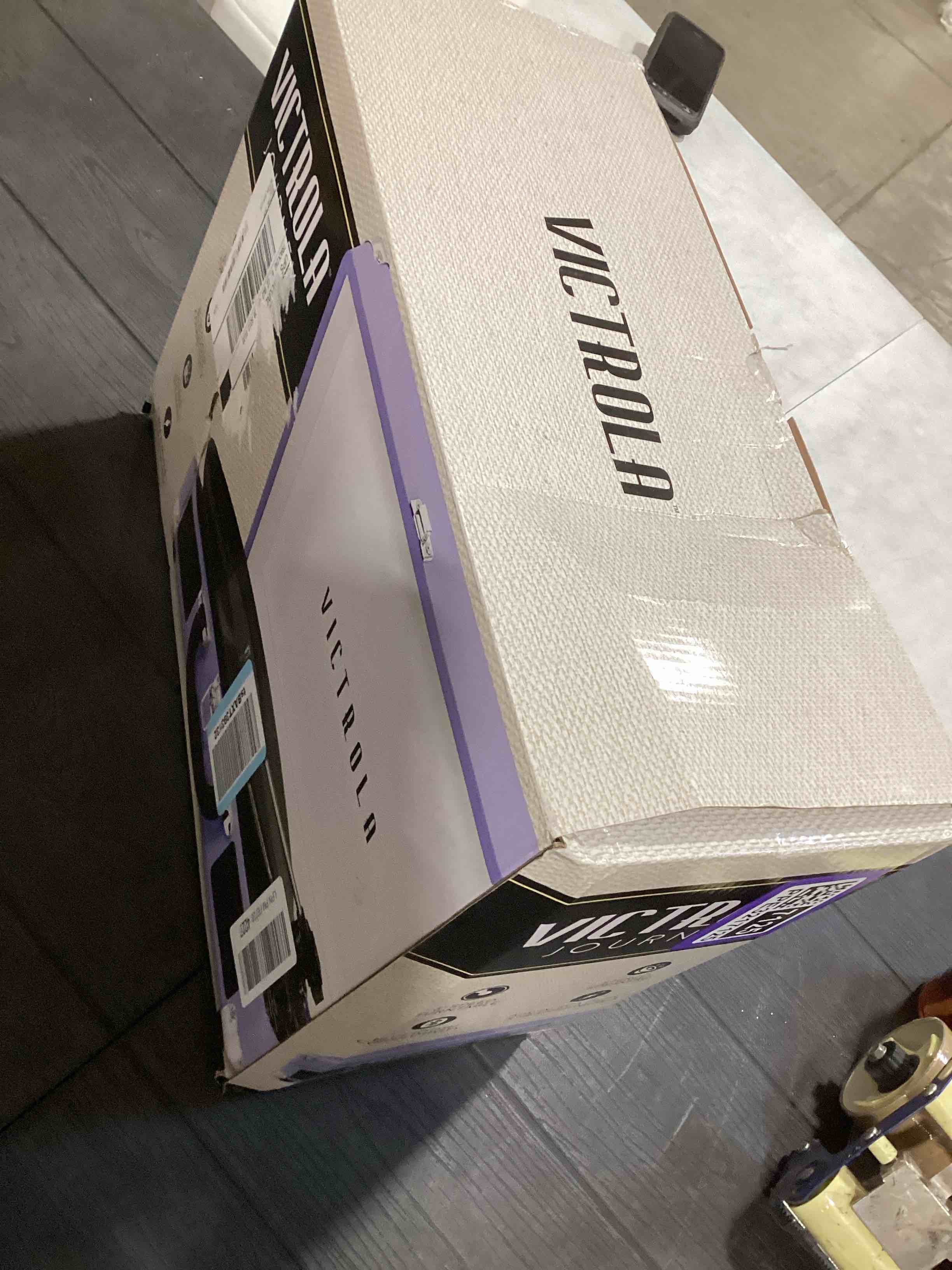 Condition photo showing As Is for Victrola Journey Bluetooth Portable Suitcase Record Player – with Built-in Speakers, 3 Speed Vinyl Record Player, RCA Out, Headphone Jack (Lavender/Silver)