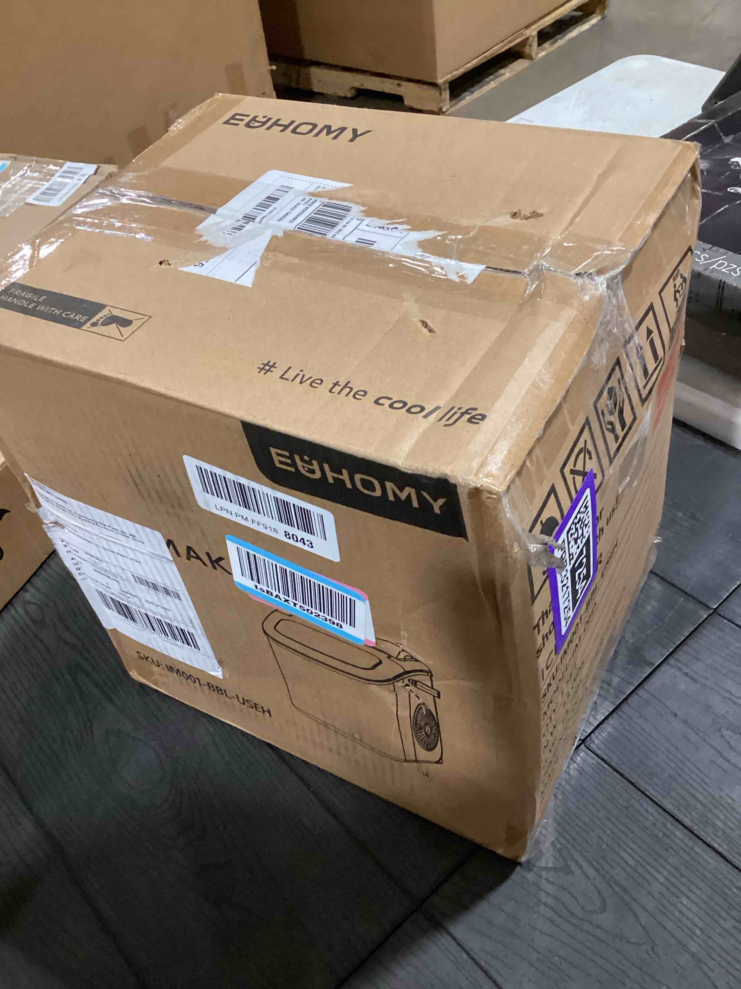 Condition photo showing As Is for EUHOMY Countertop Ice Maker Machine with Handle, 26lbs in 24Hrs, 9 Ice Cubes Ready in 6 Mins, Auto-Cleaning Portable Ice Maker with Basket and Scoop, for Home/Kitchen/Camping/RV. (Black) ICE MACHINE 11.57"D x 11.42"W x 8.74"H Black