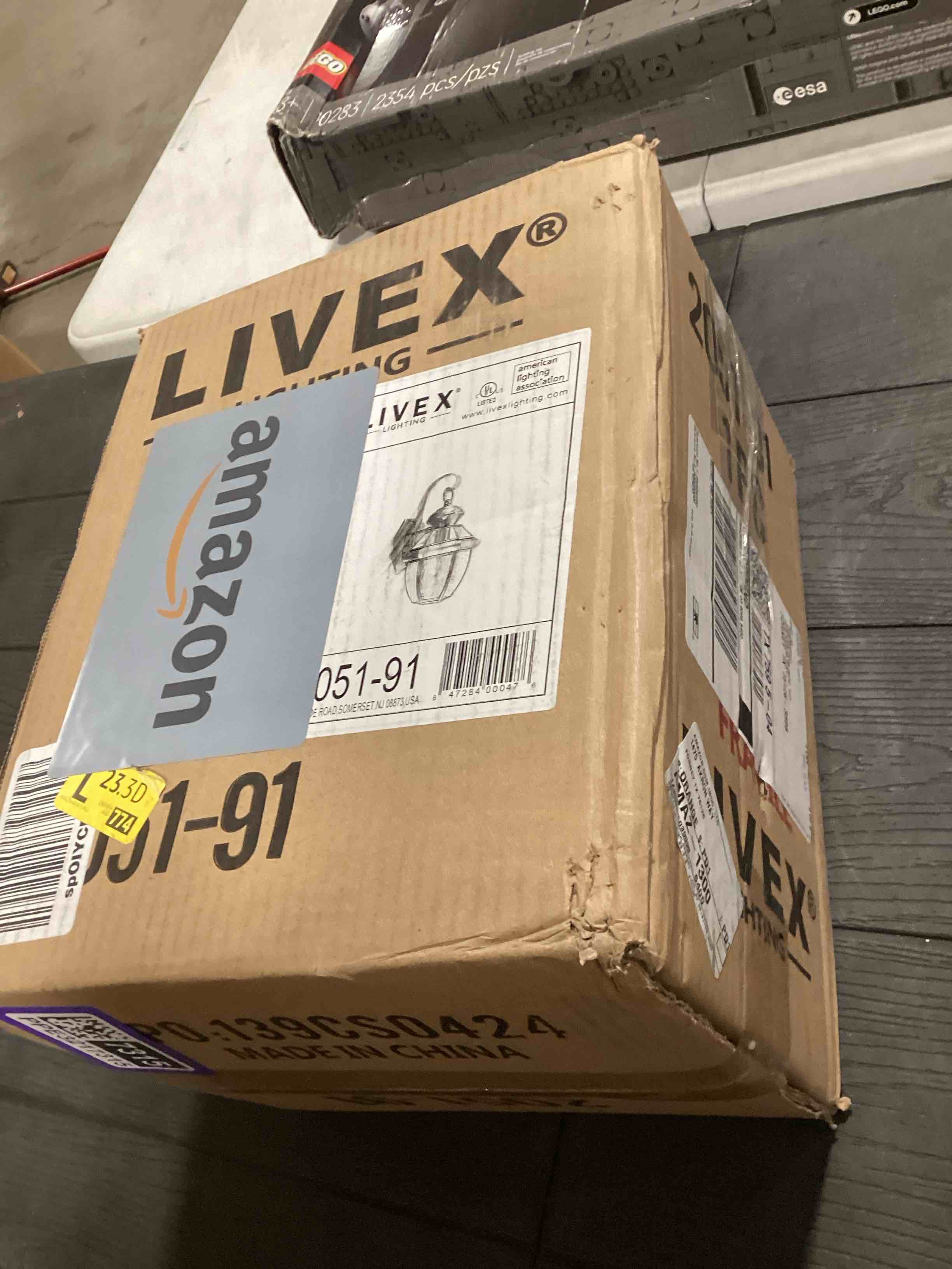 Condition photo showing As Is for Livex Lighting 2051-91 Monterey 1 Light Outdoor Brushed Nickel Finish Solid Brass Wall Lantern with Clear Beveled Glass