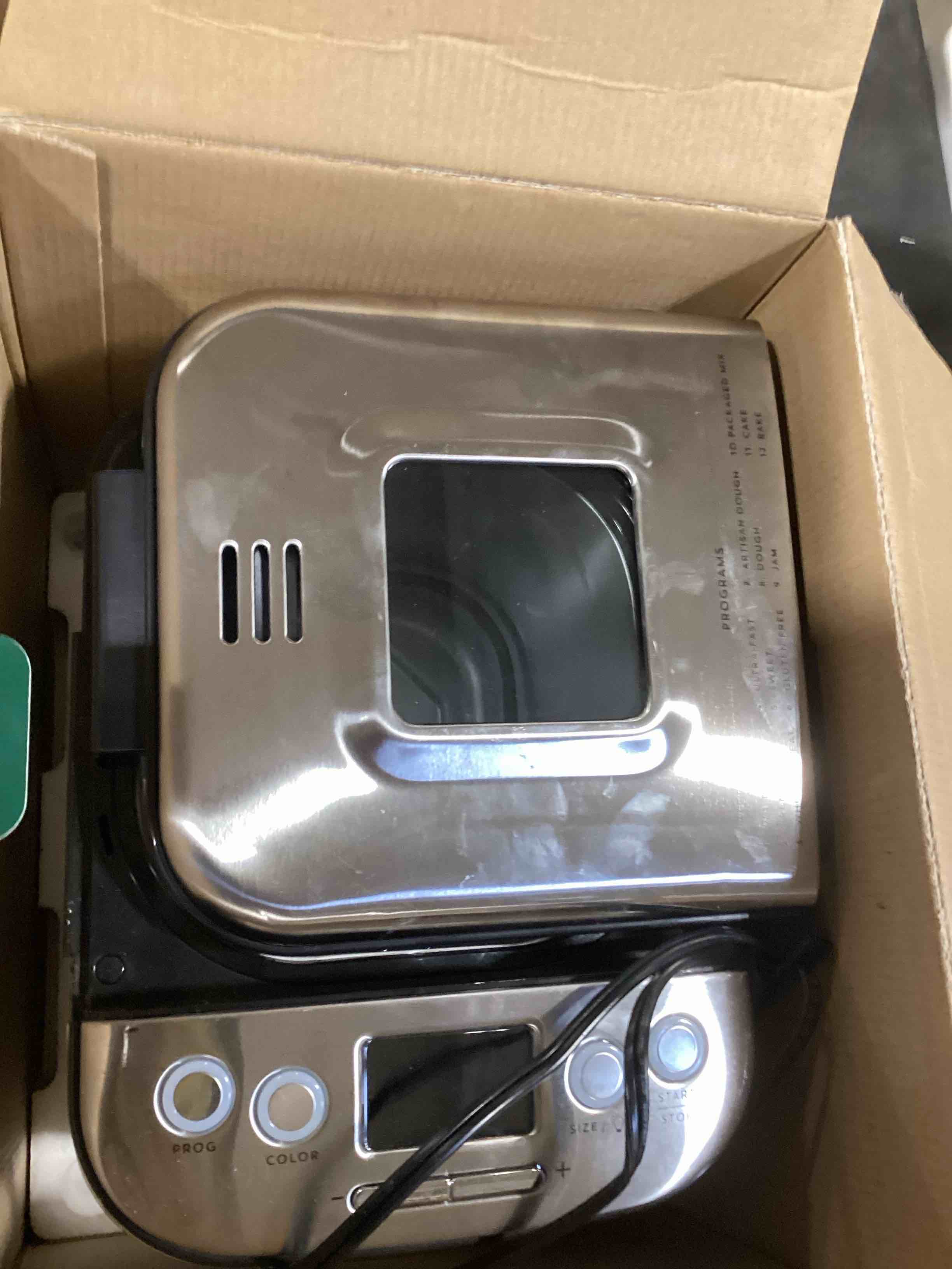 Condition photo showing As Is for Cuisinart Bread Maker Machine, Stainless Steel Automatic Bread Machine with 12 Menu Options, 3 Loaf Sizes up to 2 Lb., 3 Crust Colors, Removable Nonstick Baking Pan & Kneading Paddle, CBK-110NAS Compact Machine