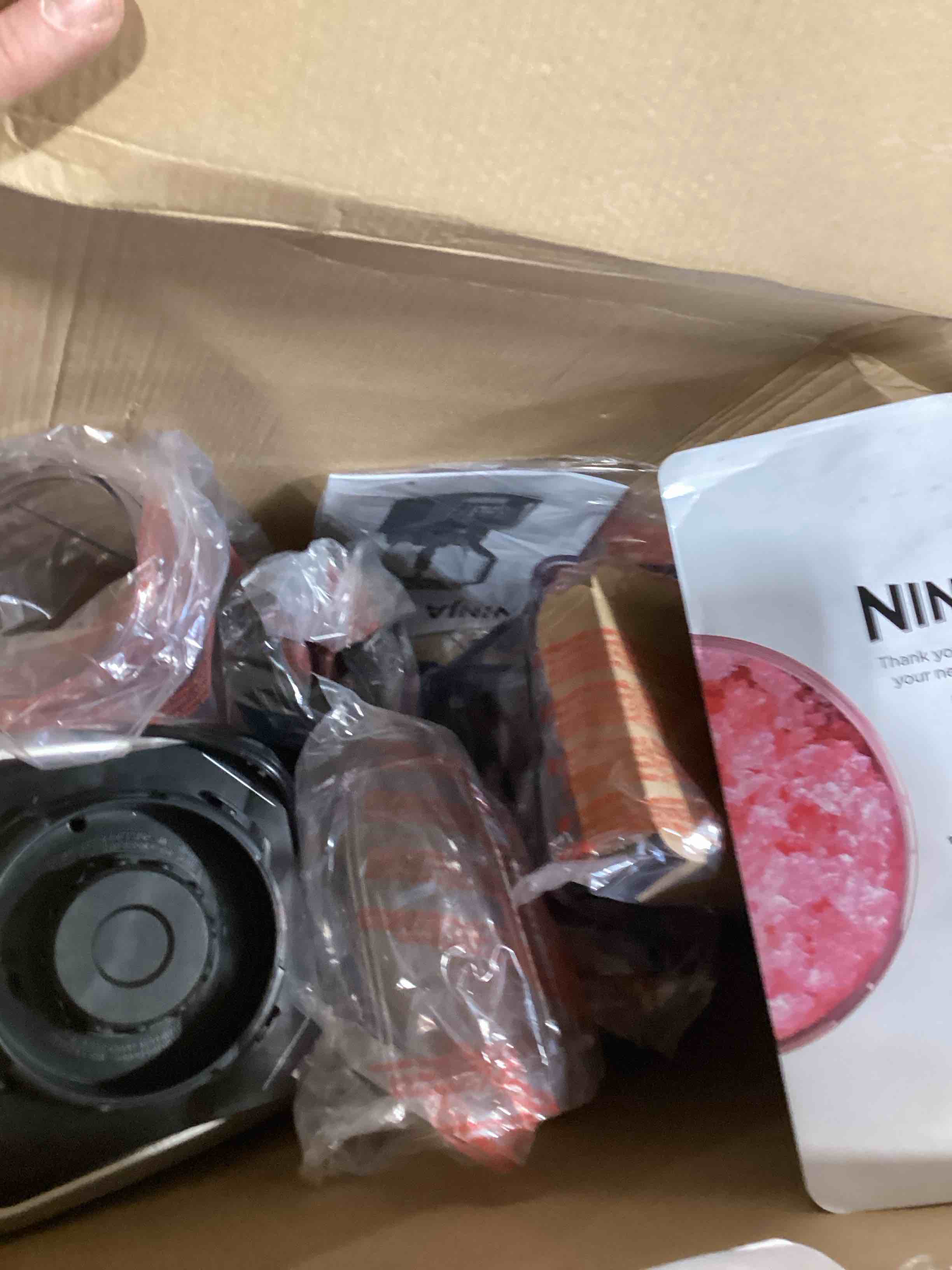 Condition photo showing As Is for Ninja BL642 Nutri Ninja Personal & Countertop Blender with 1200W Auto-iQ Base, 72 oz. Pitcher, and 18, 24, & 32 oz. To-Go Cups with Spout Lids, For Smoothies, Shakes & More, Dishwasher Safe, Black