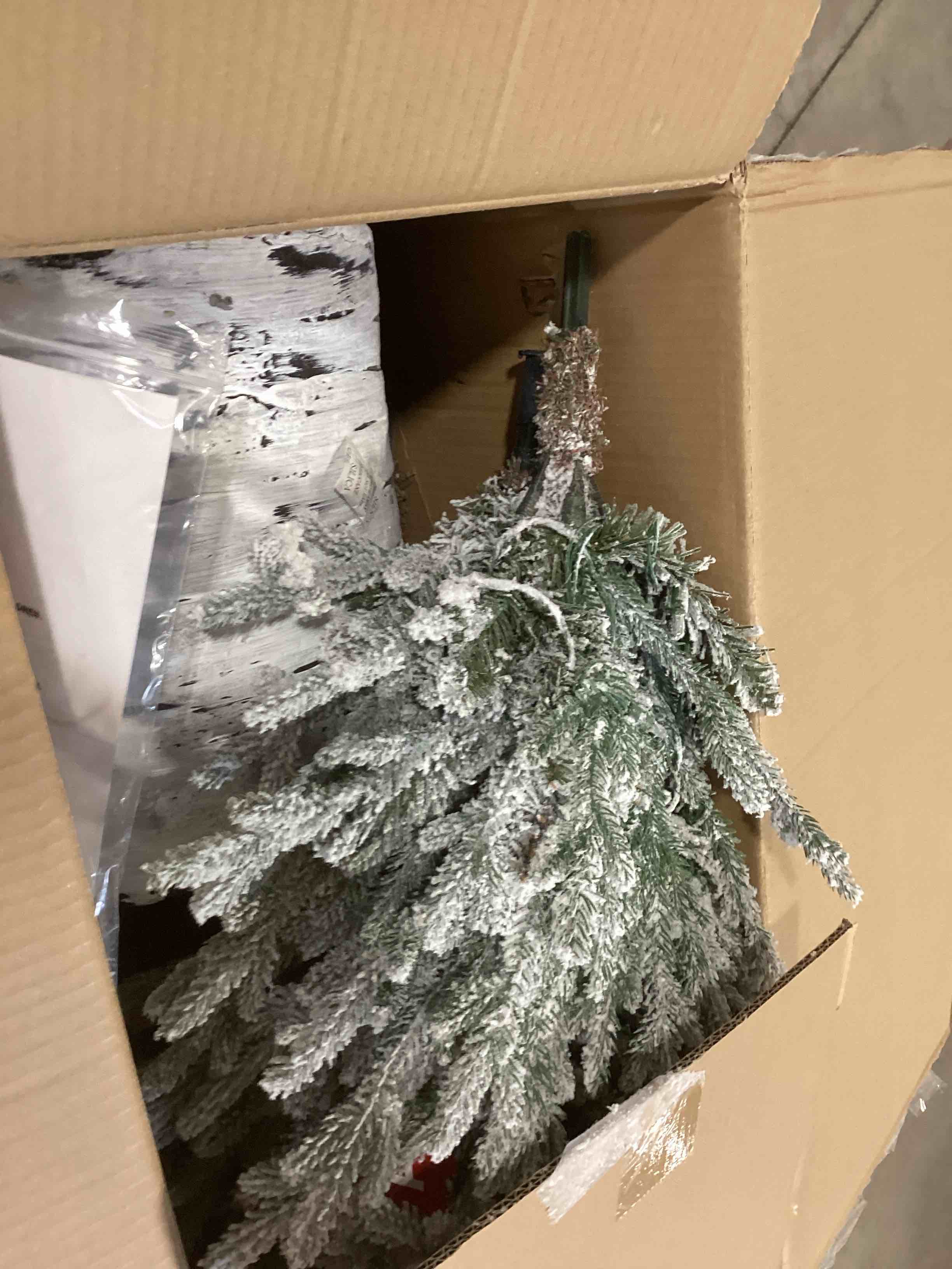 Condition photo showing As Is for Puleo International 6ft Pre-Lit Potted Flocked Arctic Fir Pencil Christmas Tree with 120 Warm White Lights, 1325 Realistic Dense Snow Flocked Branch Tips, Easy Setup Artificial Trees with Sturdy Stand 6' Flocked Arctic Fir 120 Clear Lights