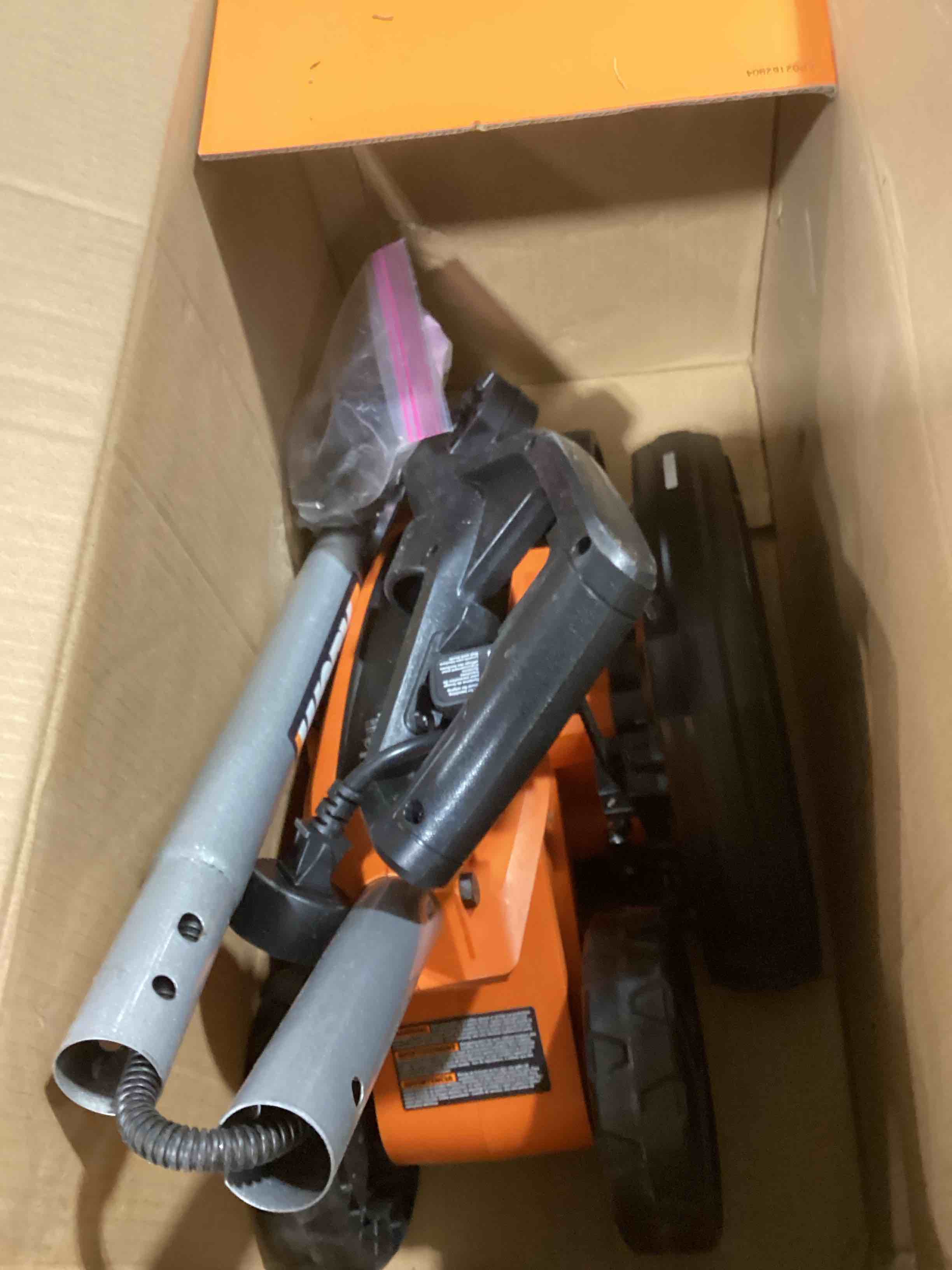 Condition photo showing As Is for WORX WG896 12 Amp 7.5 Inch Corded Electric Lawn Edger & Trencher, Orange and Black