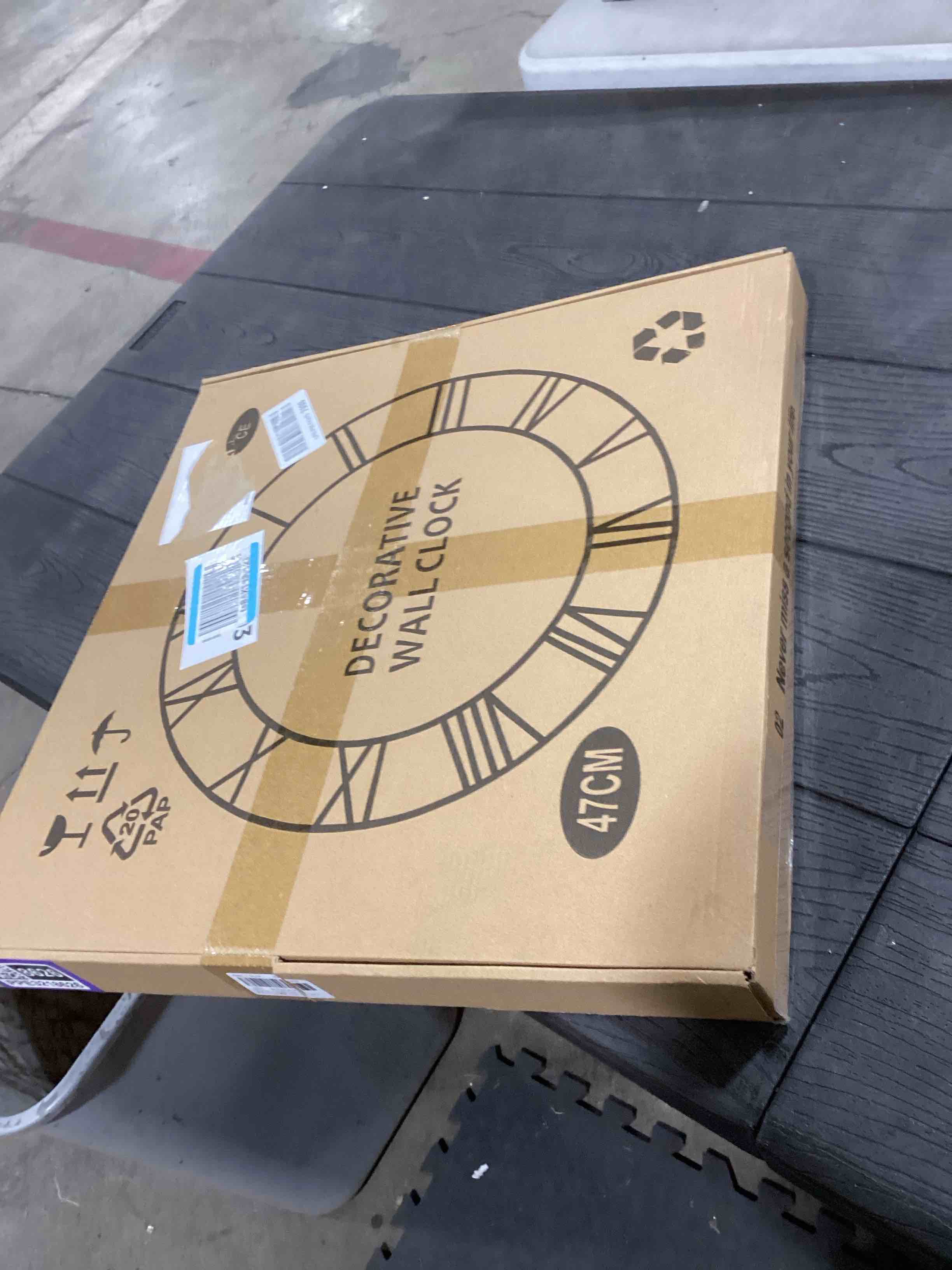 Condition photo showing Good Condition for 1st owned Large Wall Clock Silent Non-Ticking Roman Numerals Vintage Battery Operated (24 inch,18inch,16inch) Farmhouse Wall Clock for Living Room, Bedroom, Kitchen, Cafe Decor-Black 47CM Black 18inch