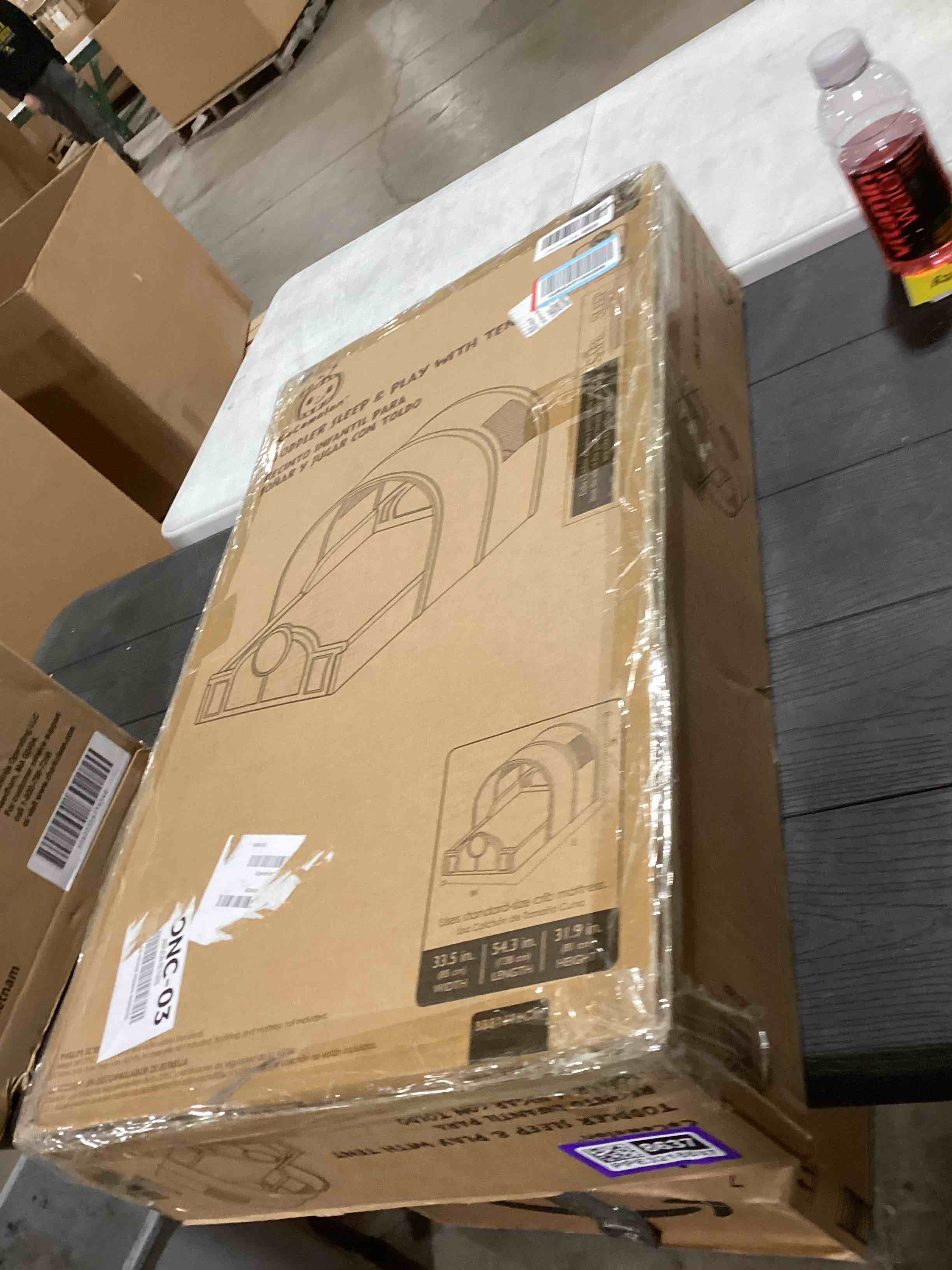 Condition photo showing Good Condition for Delta Children - CoComelon Sleep and Play Toddler Bed with Tent, Blue Cocomelon Toddler Bed