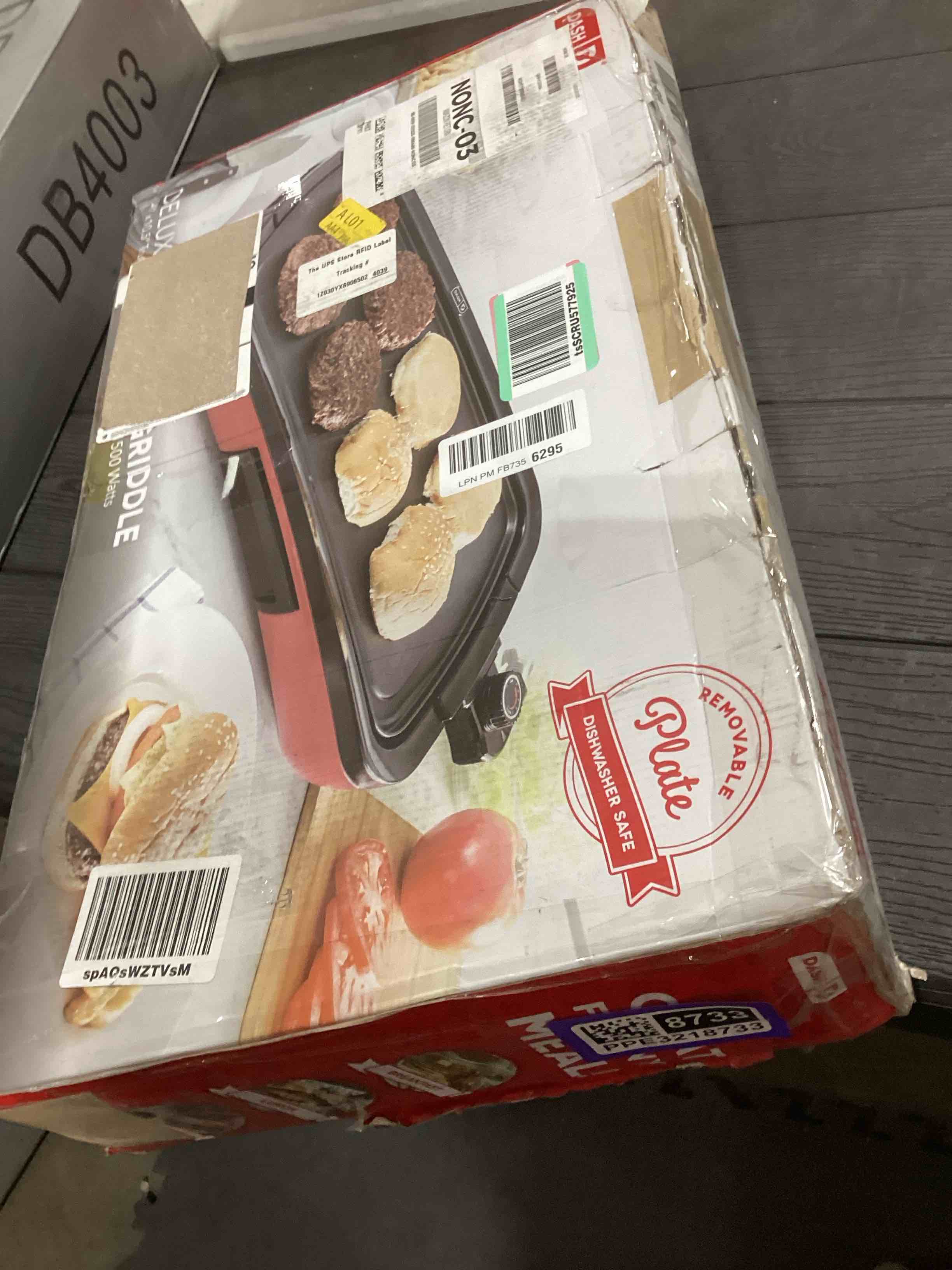 Condition photo showing As Is for DASH Deluxe Everyday Electric Griddle with Dishwasher Safe Removable Nonstick Cooking Plate for Pancakes, Burgers, Eggs and more, Includes Drip Tray + Recipe Book, 20” x 10.5”, 1500-Watt - Red