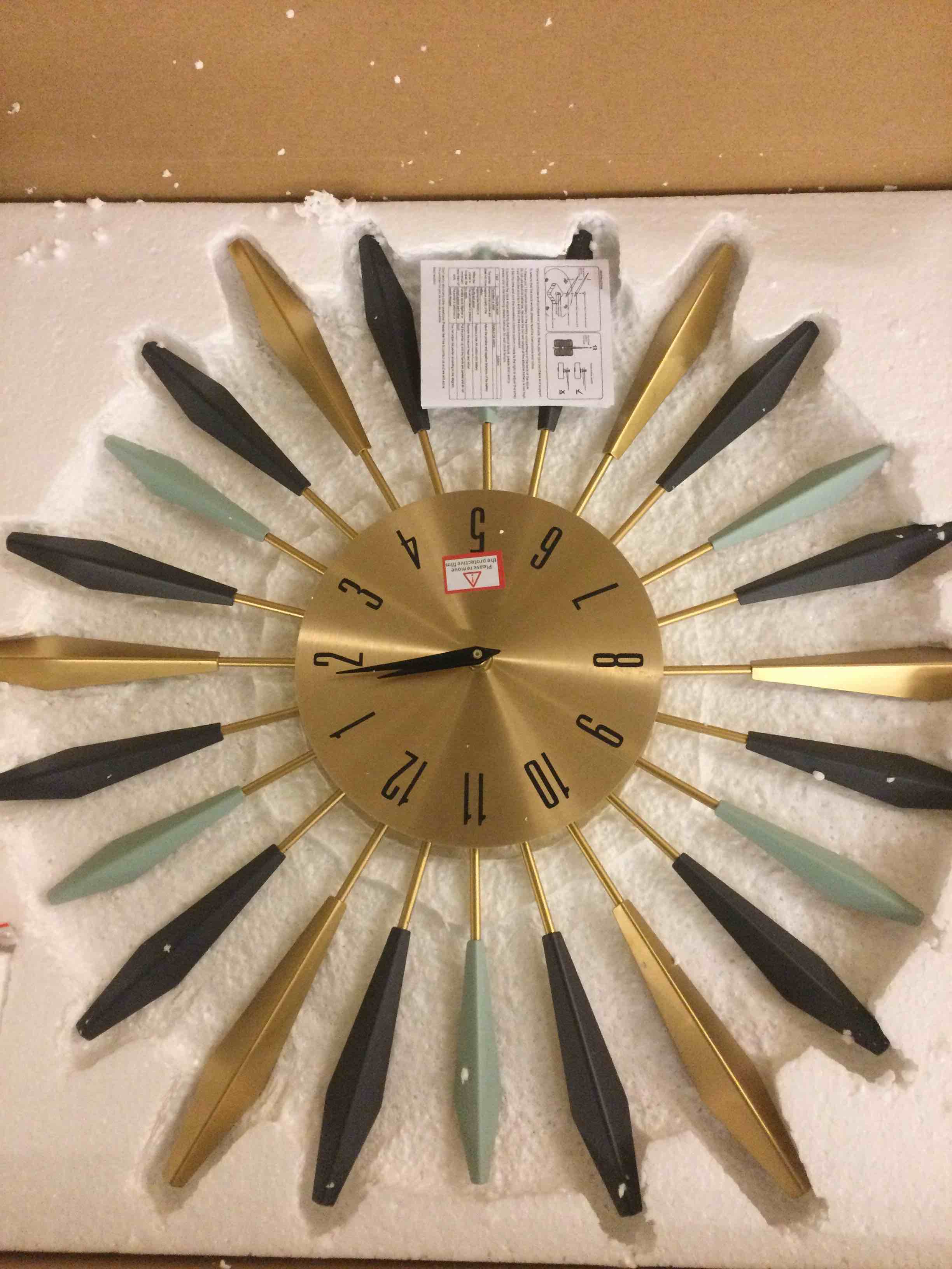 Condition photo showing Good Condition for YISITEONE Large Wall Clock Metal Decorative, Mid Century Silent Non-Ticking Big Clocks, Modern Home Decorations for Living Room,Bedroom,Dining Room, Office, 22 inch Medium 1.modern