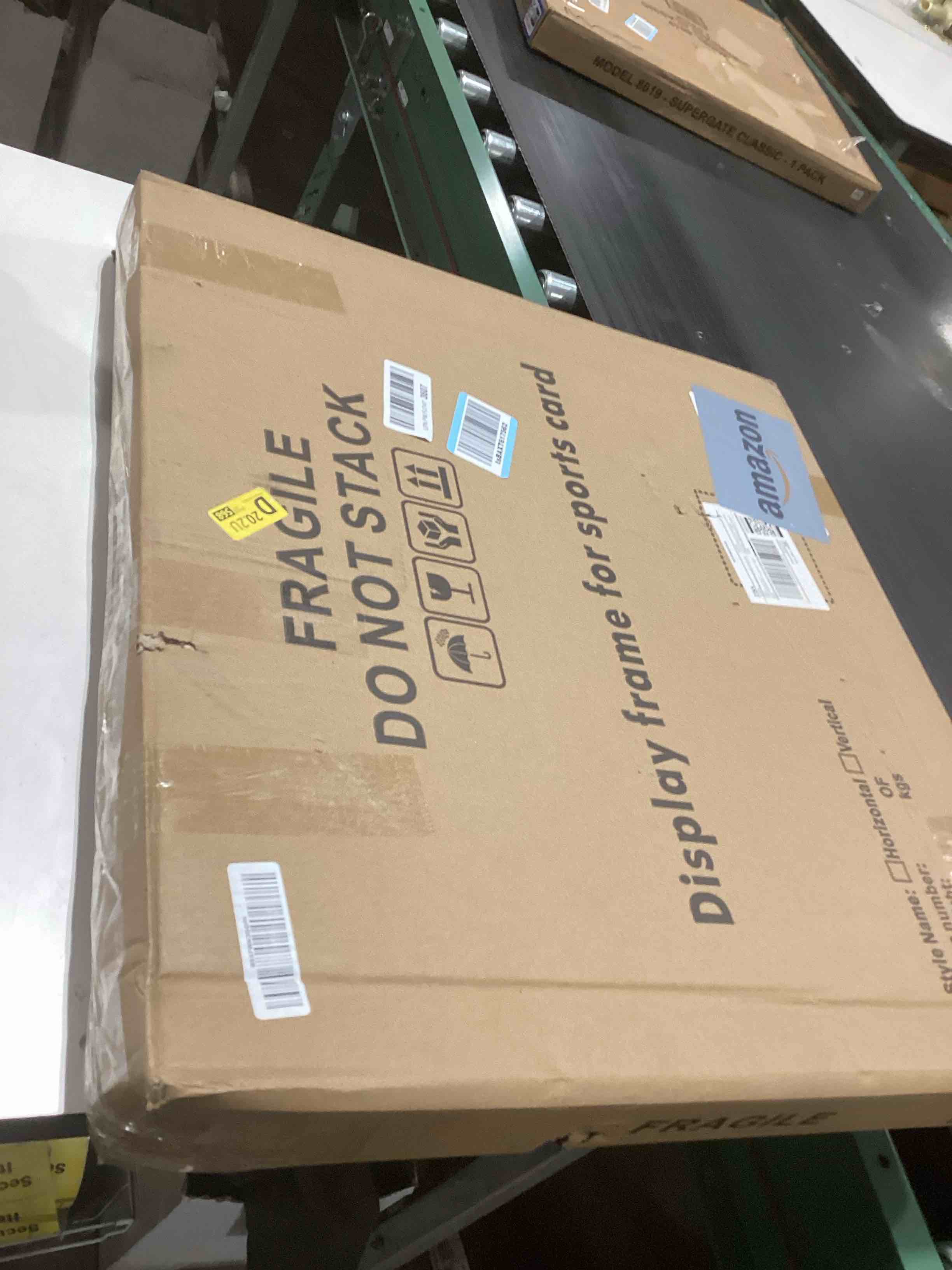 Condition photo showing As Is for Baseball Card Display Case 24 Graded Sport Card Display Case Wall Mount with Clear View and UV Protection Acrylic Door for Baseball Football Basketball Hockey Trading Card Collection, Black 24-Vertical-Black-1Pack