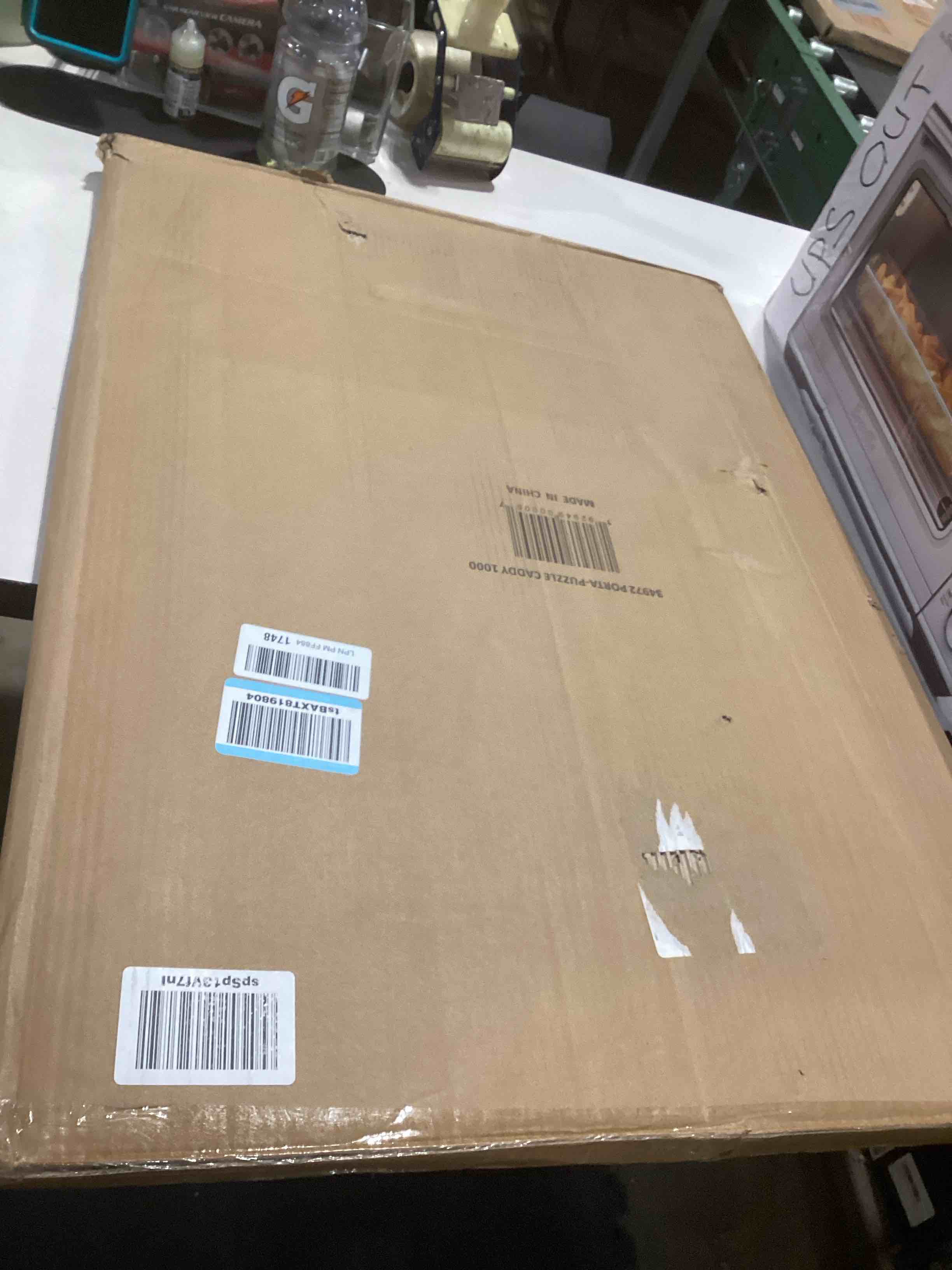 Condition photo showing As Is for Bits and Pieces Portapuzzle Portable Puzzle Board 1000 Pieces - Compact Lightweight Foldable Portable Puzzle Mat with Removable Sorting Areas - 22.5 Inch x 31.5 Inch Standard 1000 pc Size Caddy