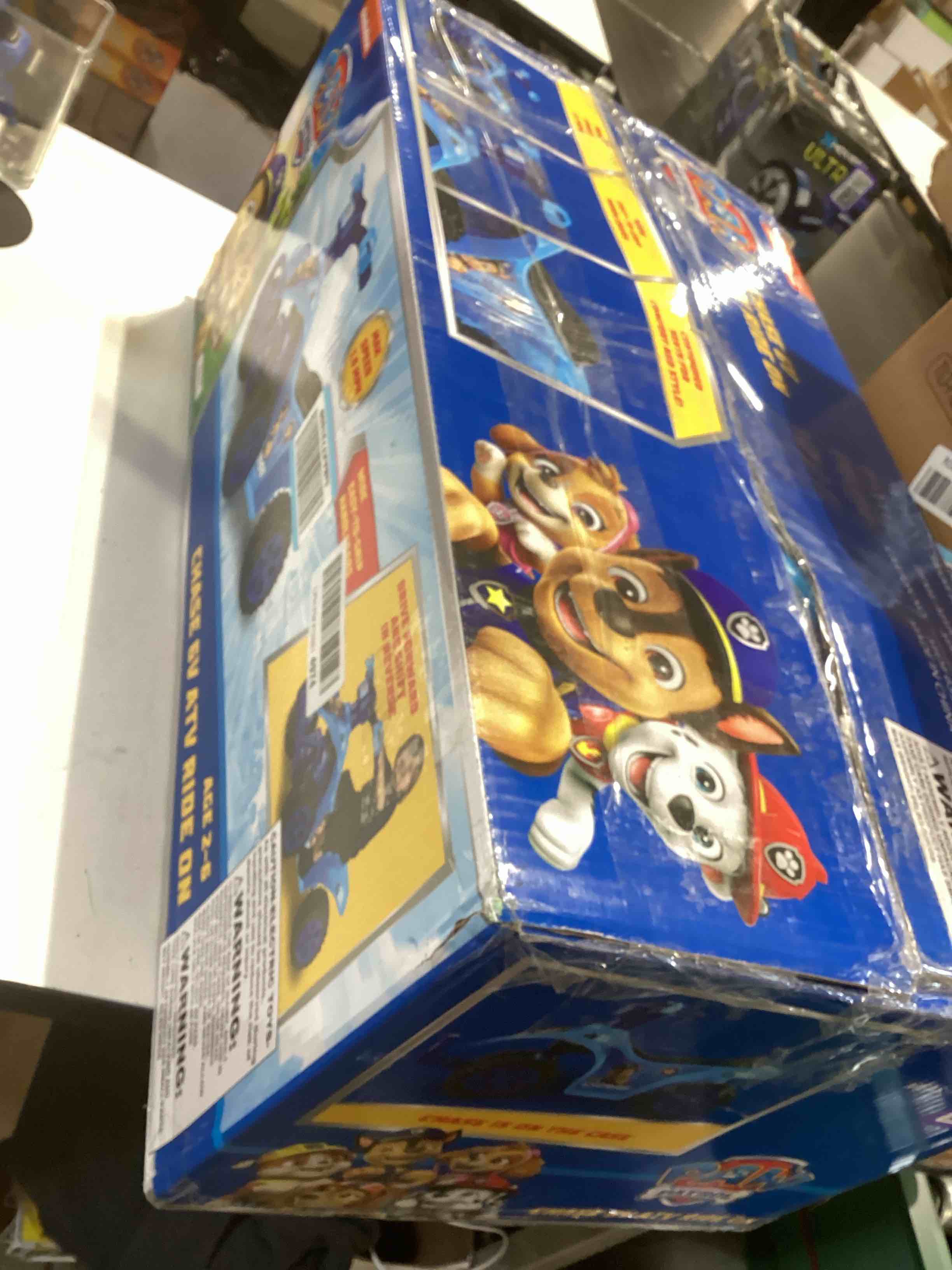 Condition photo showing As Is for Paw Patrol Chase 6V Quad for Kids - Powerful and Safe Ride-On Toy with Rechargeable Battery, Forward and Reverse Driving, Foot Peddle, Ages 2-3 Paw Patrol Chase 6V ATV Quad