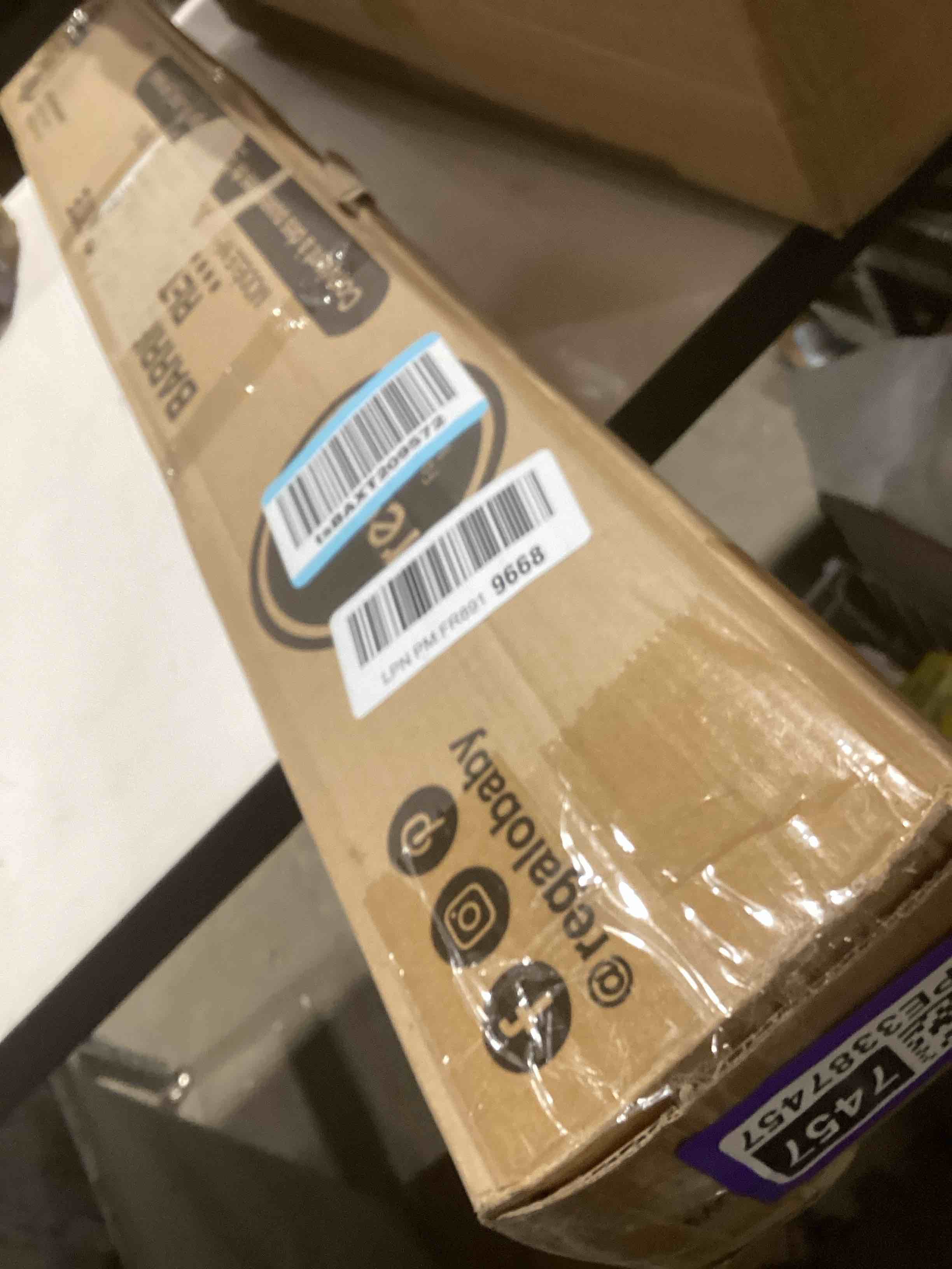 Condition photo showing Good Condition for Regalo Extra Wide Retractable Baby Gate, Award Winning Brand, Expands up to 50" Wide, Easy Install, Includes Installation Template, Locking Indicator