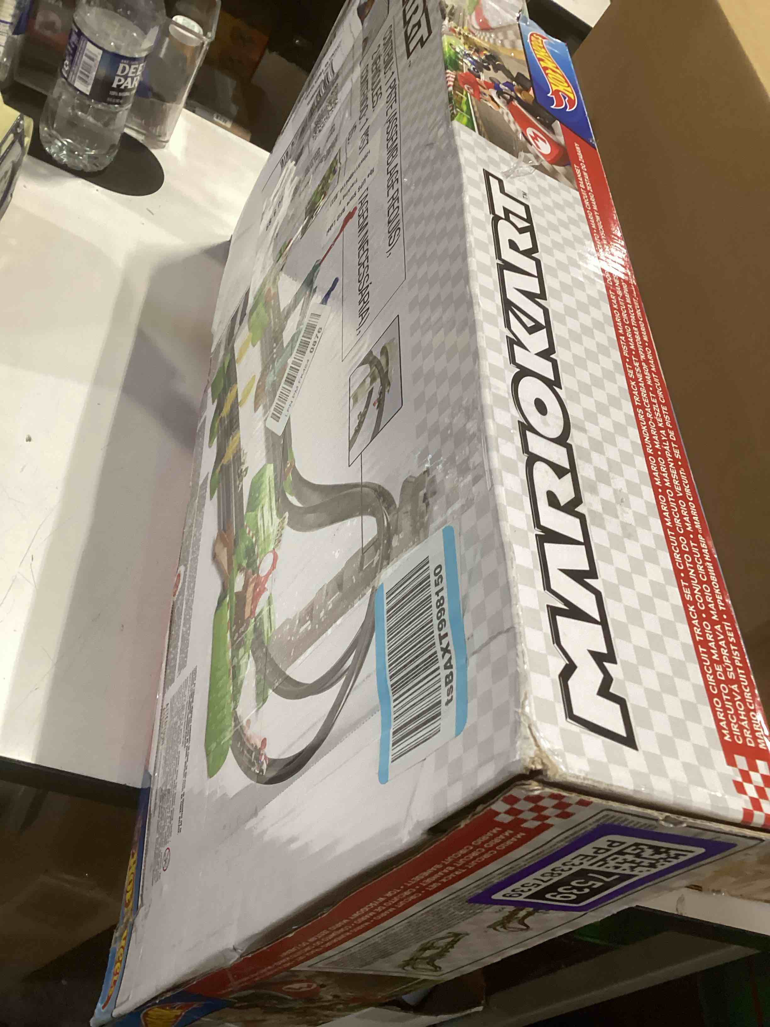 Condition photo showing As Is for Hot Wheels Mario Kart Circuit Track Set & 2 Toy Vehicles, Racing Playset Includes Booster, Plus Mario & Yoshi Karts (Amazon Exclusive) Mario Kart Track Set