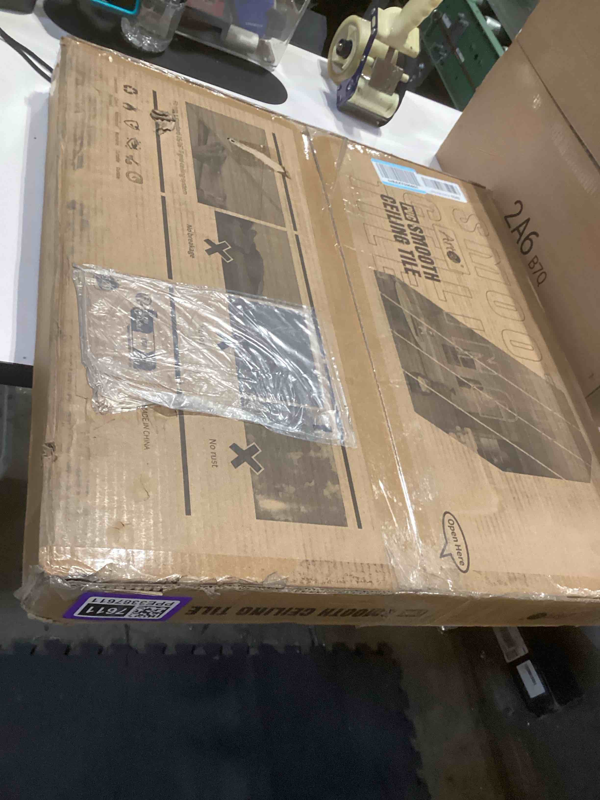 Condition photo showing Good Condition for Art3d 12-Pack Stucco Texture Drop Ceiling Tiles 2x2 FT - Fire-Rated, Waterproof, Reusable - Premium PVC 24x24 Inch Ceiling Panels for Living Room Kitchen Bathroom Basement Office, White 24*24 Square Stucco White 12