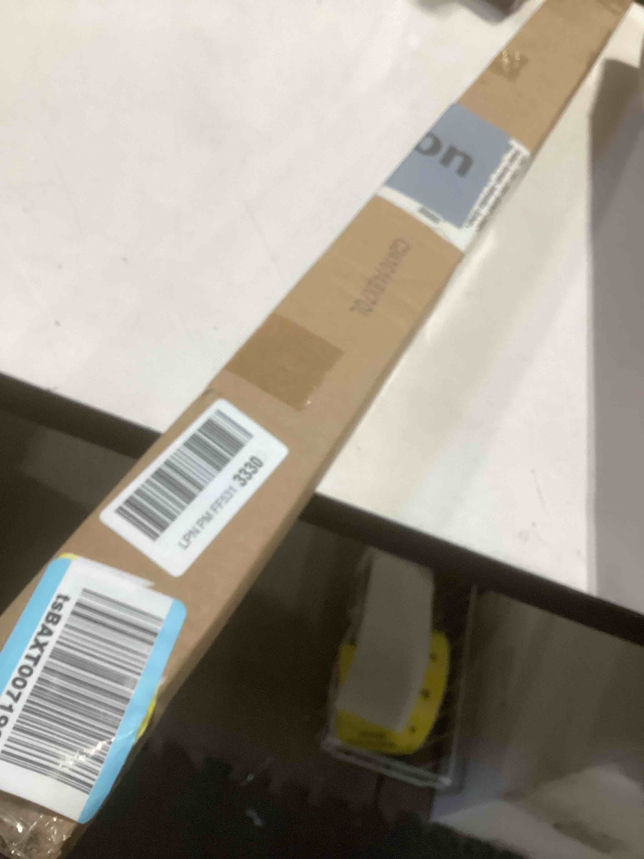 Condition photo showing Good Condition for Amazon Basics Tension Curtain Rod, Adjustable 36-54" Width - Bronze, Classic Finial