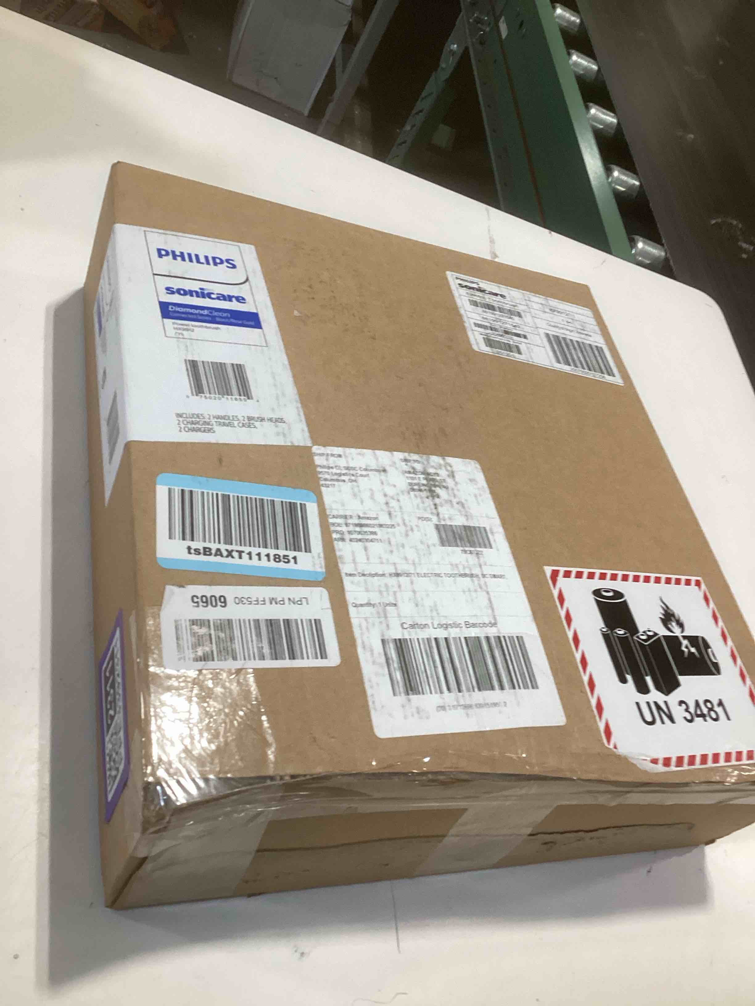 Condition photo showing Good Condition for Philips Sonicare DiamondClean Connected Electric Toothbrush 2 Pack, x2 Sonic Toothbrushes, x2 Charging Travel Cases, x2 A3 Brush Heads, 12 Brushing Settings, (Black and Rose Gold) Model HX9912/71 Black and White 1 Count (Pack of 2)