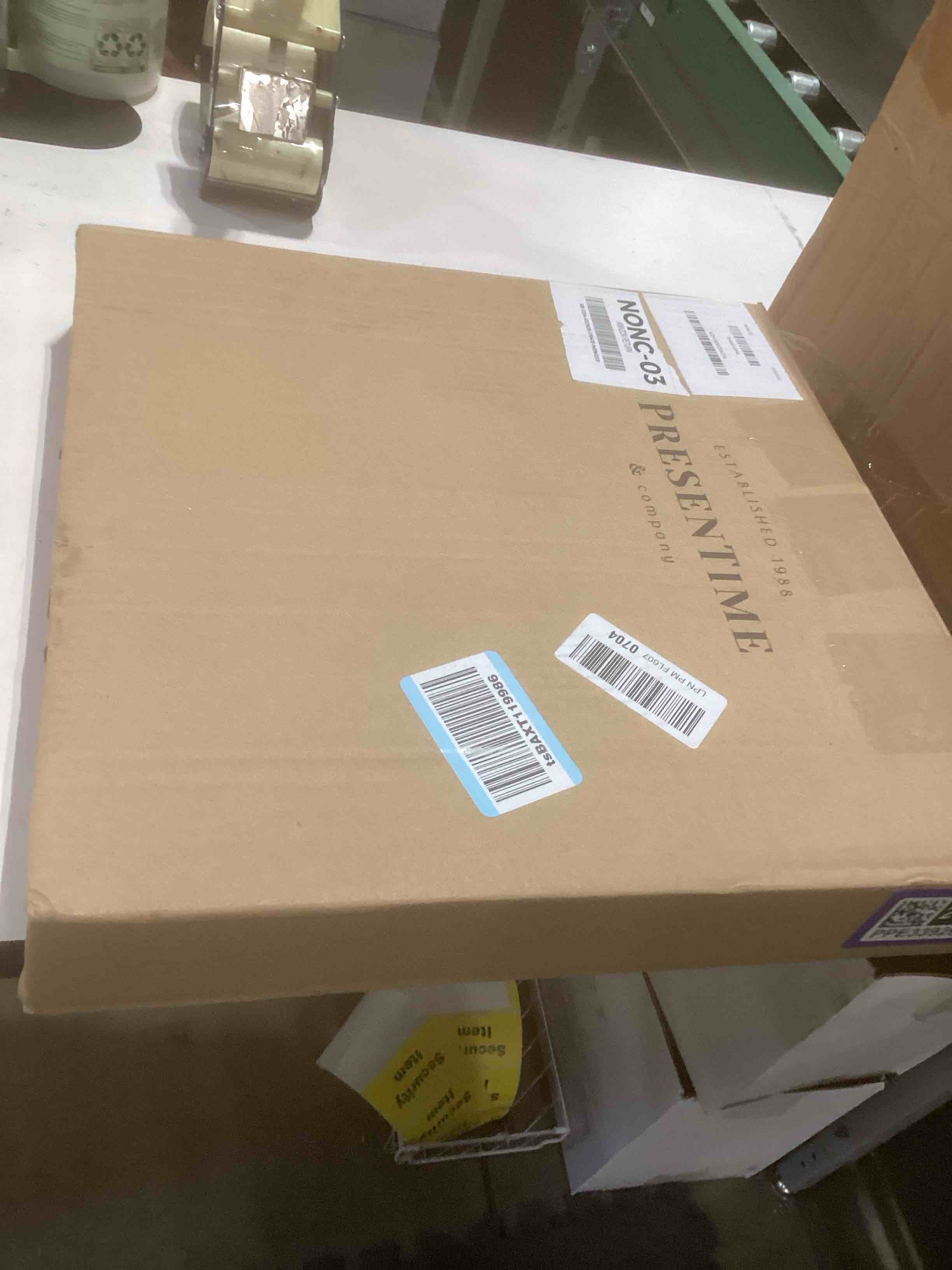 Condition photo showing Good Condition for Presentime & Co. 16" Anton Modern Farmhouse Square Clock, Silent No Ticking, Wall Art and Timepiece for Home Decoration/Wall Décor, Oil Rubbed Bronze Color Oil Rubbed Bronze 16 inch