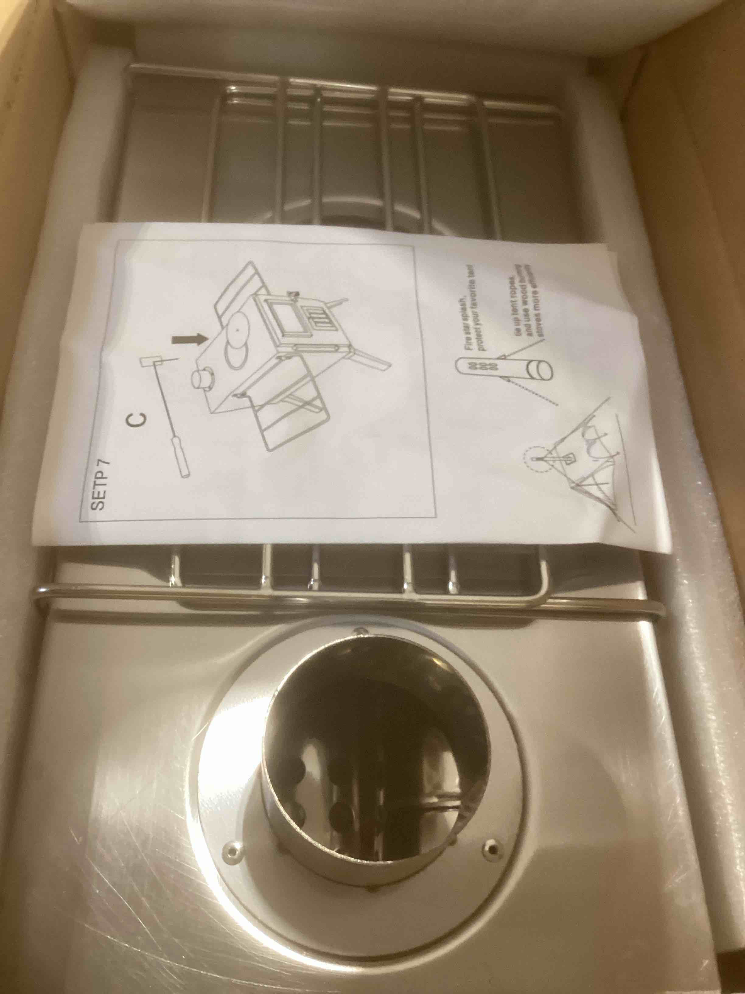 Condition photo showing Good Condition for Wood Burning Stove,Portable Camping Stove with Chimney Pipes,Front Window?Side Racks,Mini Wood Stove for Outside Tent,Cookout,Truck Travel and inside Woodcutter's Cottage Stainless Steel