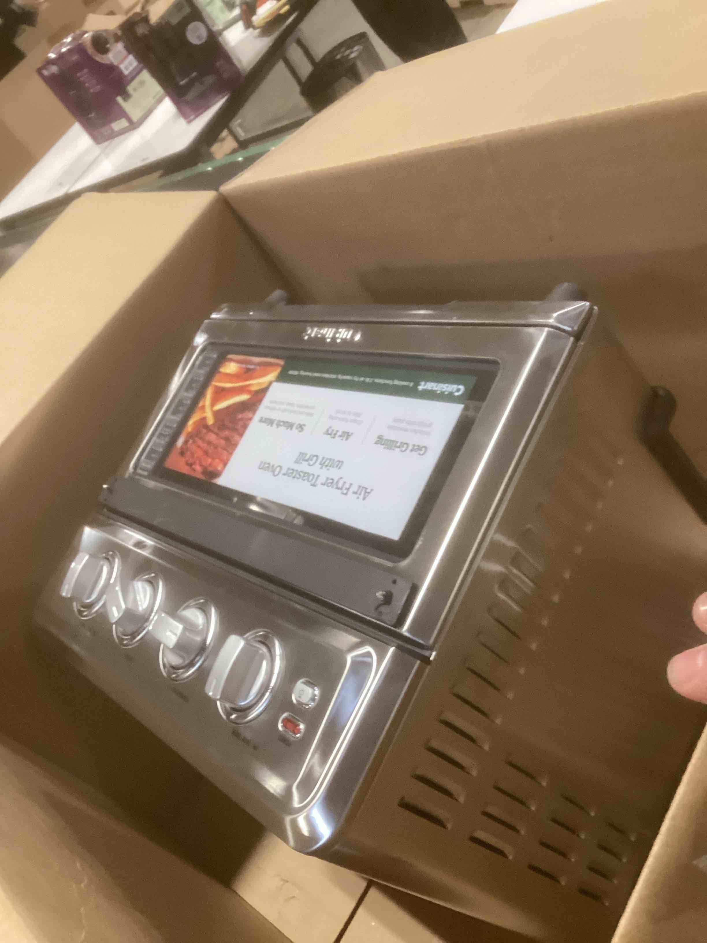 Condition photo showing As Is for Cuisinart Air Fryer Toaster Oven, 1800W, 8-in-1 with Air Fry, Convection, Broil & Warm, 0.6 Cubic Feet, 60-Minute Timer, TOA-70NAS, Stainless Steel Stainless Steel Convection Toaster Air Fryer Oven w/ Grill