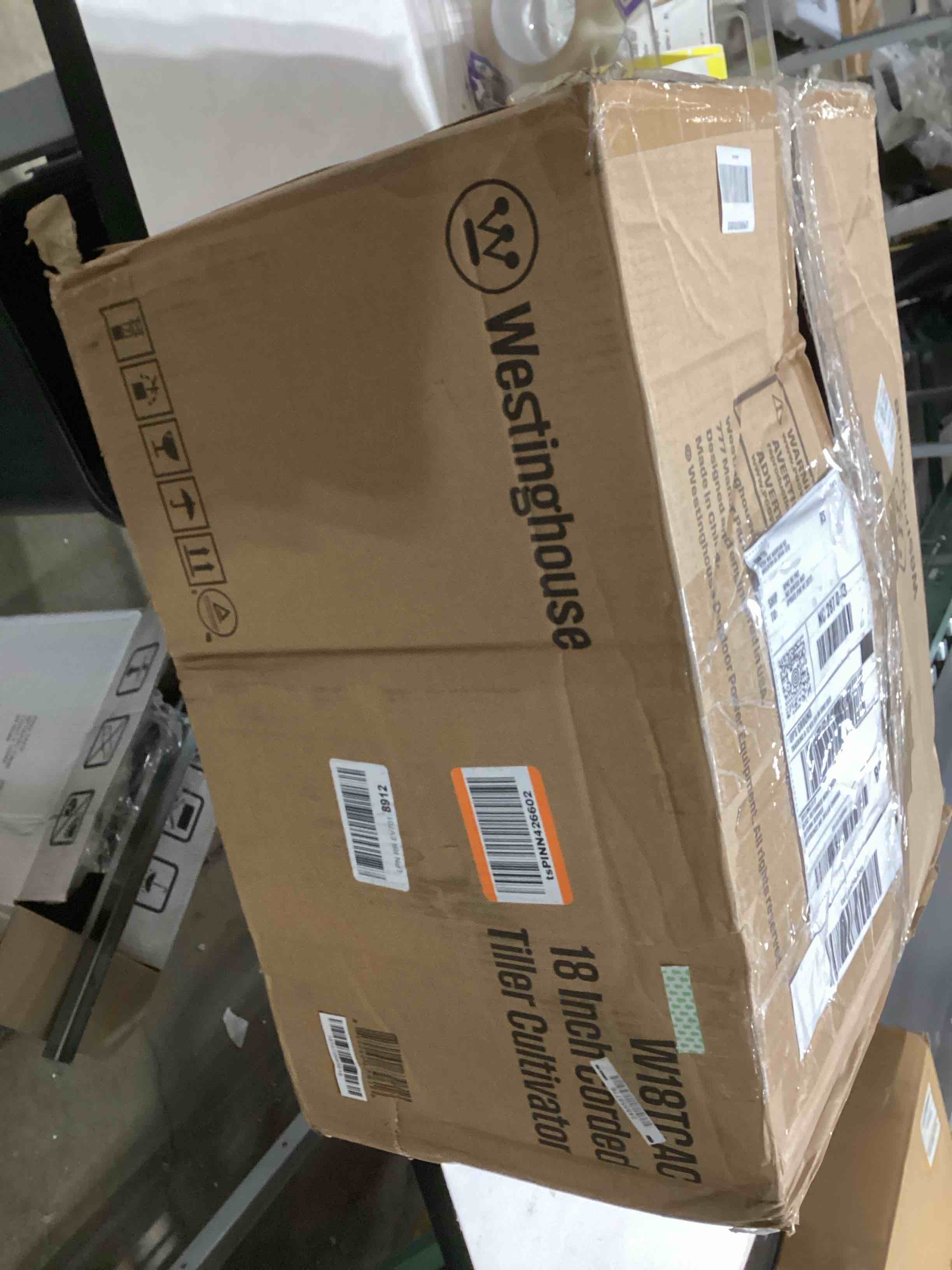 Condition photo showing As Is for Westinghouse 18-Inch, 15 Amp Corded Electric Tiller Cultivator for Gardening with 6 Steel Blades 18 in. Tiller