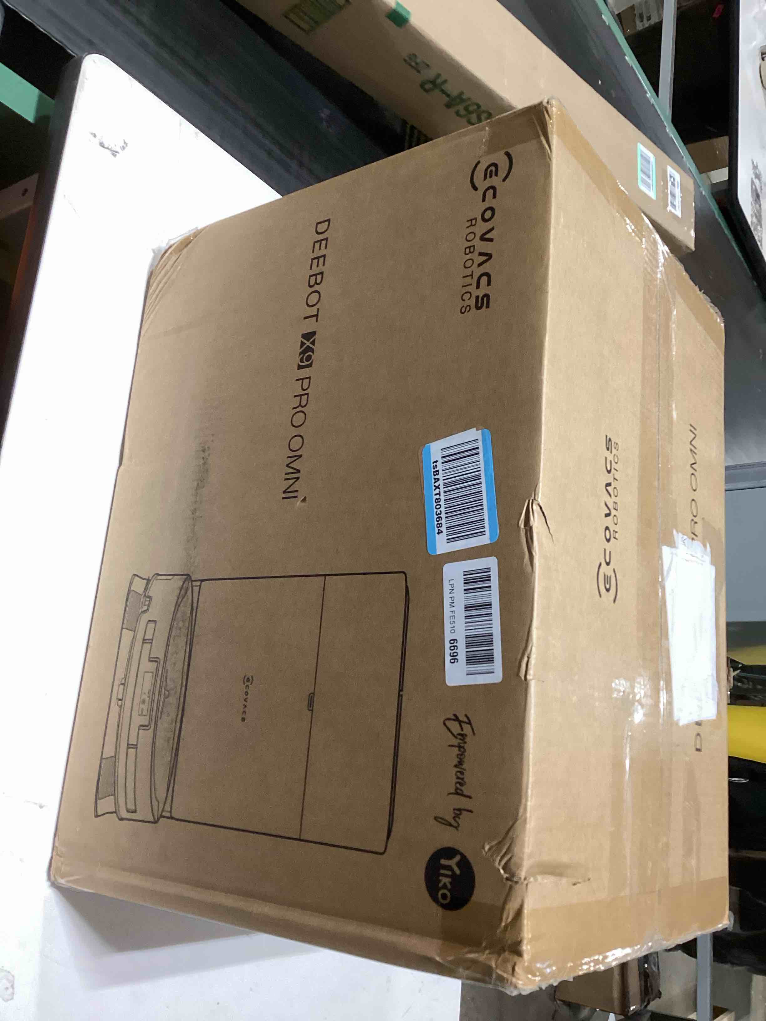 Condition photo showing As Is for ECOVACS DEEBOT X9 PRO Omni Robot Vacuum and Mop, Blast™ 16,600Pa Suction, OZMO Roller Instant Self-Washing Mopping, ZeroTangle™ 3.0, Triple Lift System, AI Smart Navigation, Hands-Free Omni Station