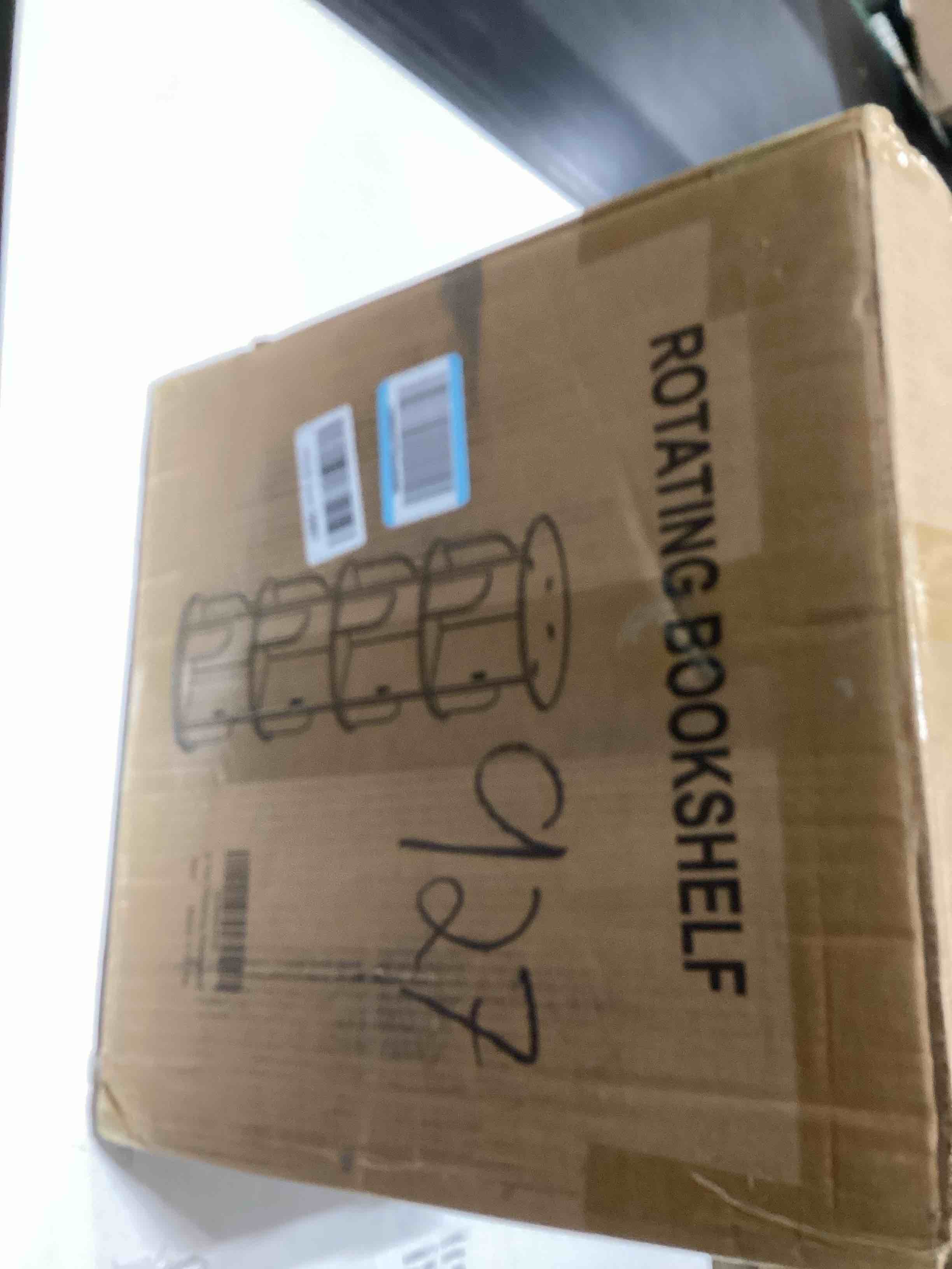 Condition photo showing As Is for 4 Tier Rotating Bookshelf Tower, Spinning Bookshelf, Revolving 360° Bookcase Storage Round Carousel, Vertical Rotate Turning Spiral Corner Organizer Lazy Susan, White