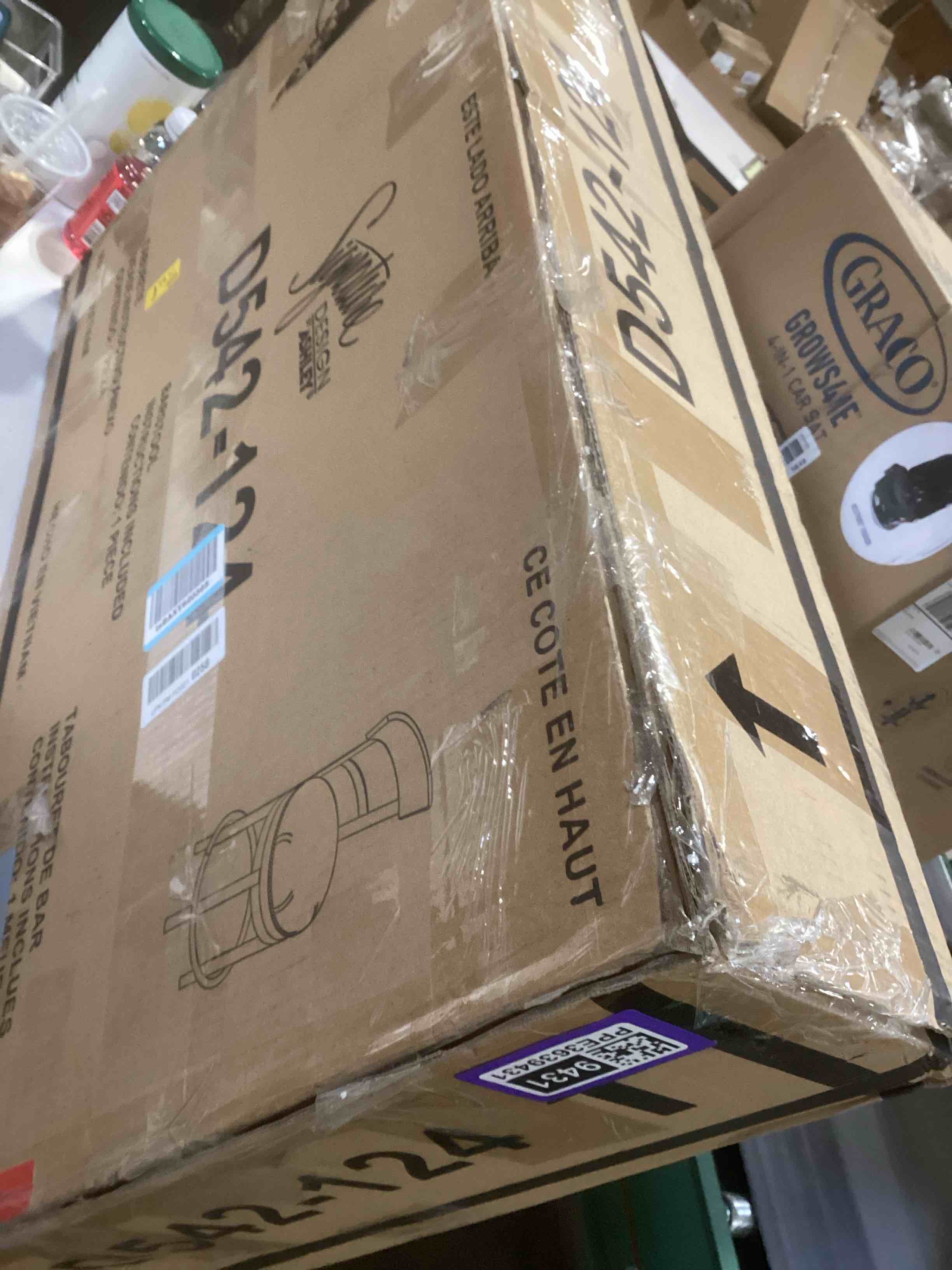 Condition photo showing Good Condition for Signature Design by Ashley Pinnadel |24.25" Counter-Height Swivel Bar Stool – Modern Farmhouse, Faux Leather, 360° Swivel, Nailhead Trim, Rustic Light Brown Light Brown Counter High Back