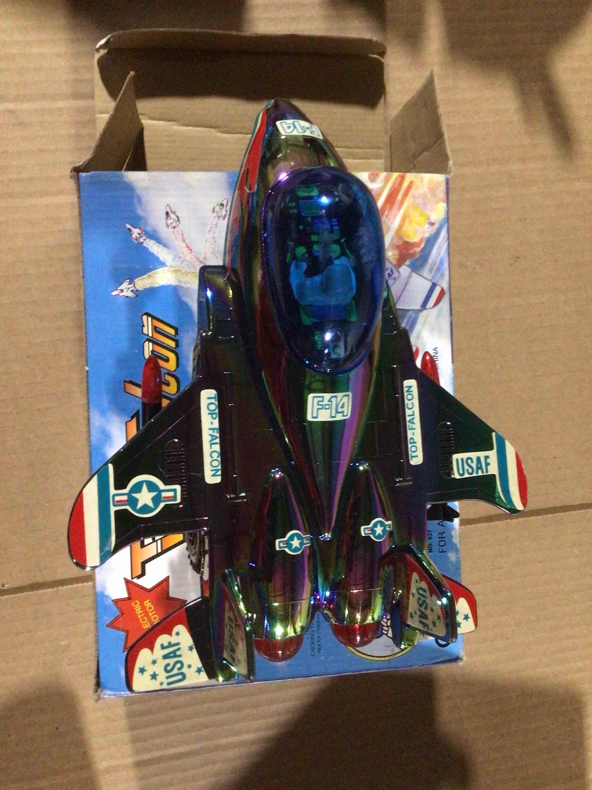 Condition photo showing New/Like New for blue airplane toy with wheels 