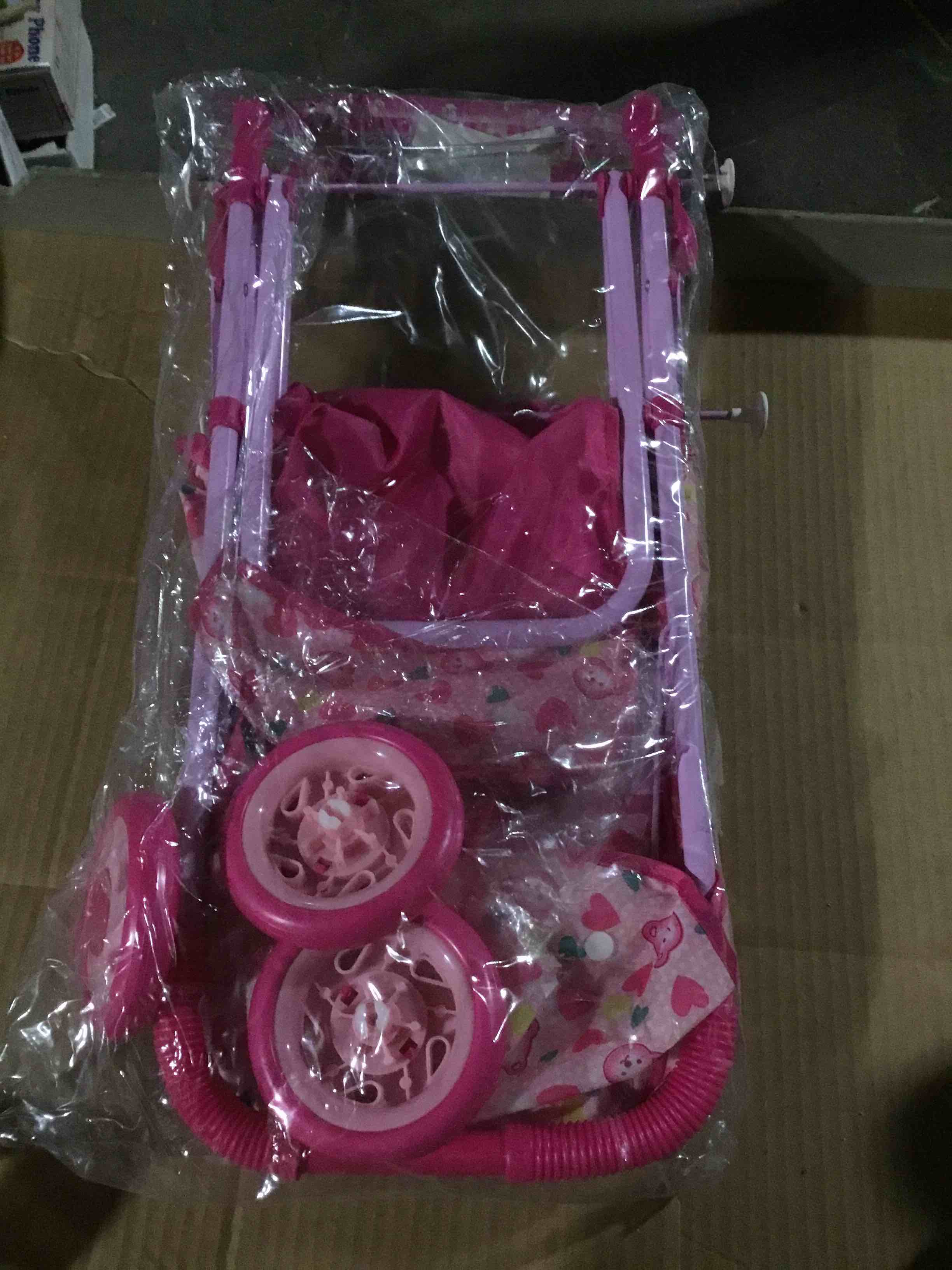 Condition photo showing New/Like New for Toy stroller for dolls, pink and designed to look a real baby stroller ,manufactured by 5he Cathay doll brand