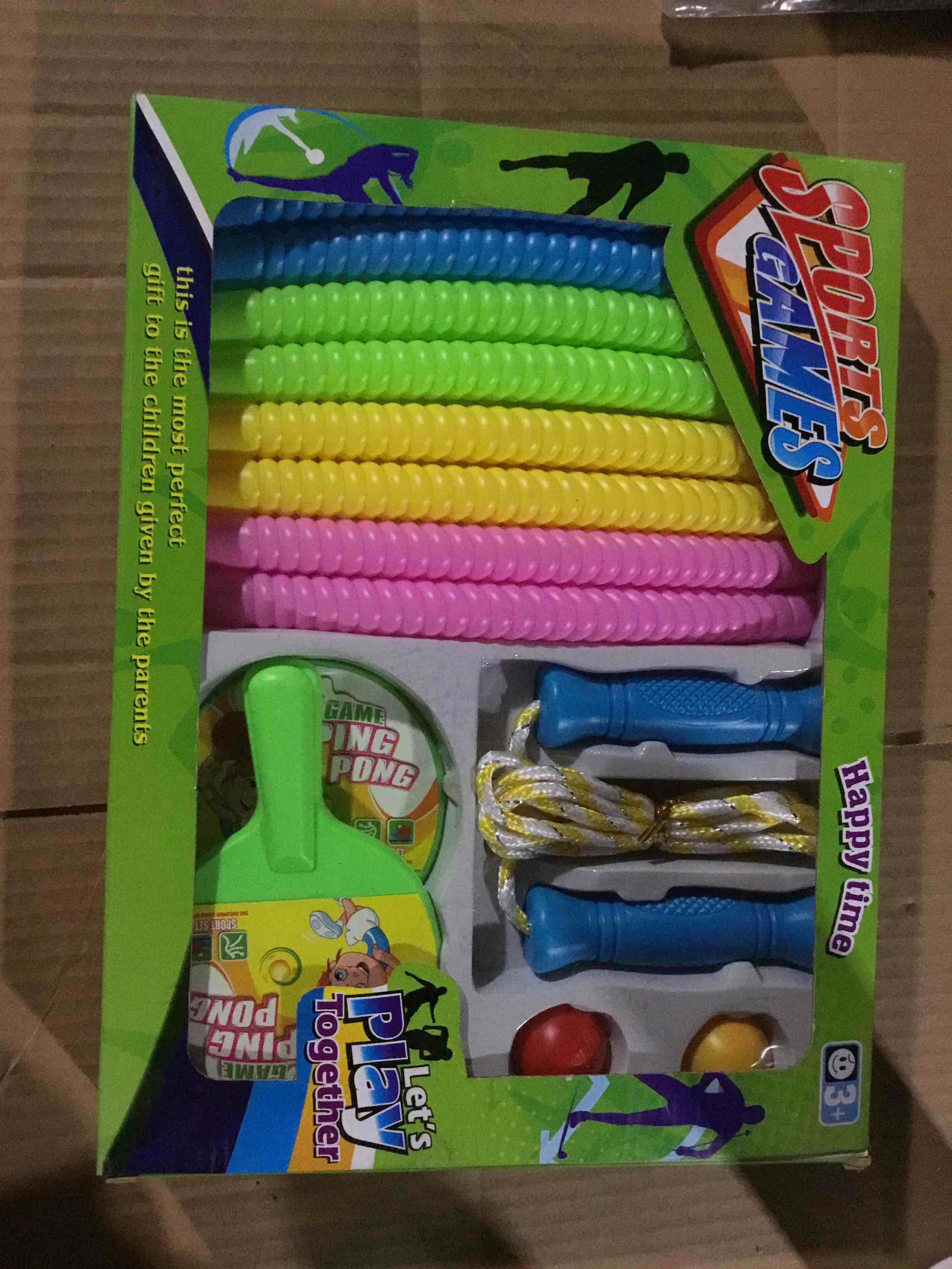 Condition photo showing New/Like New for Box with a set of sports toys that includes colored jump ropes and a ping pong game
