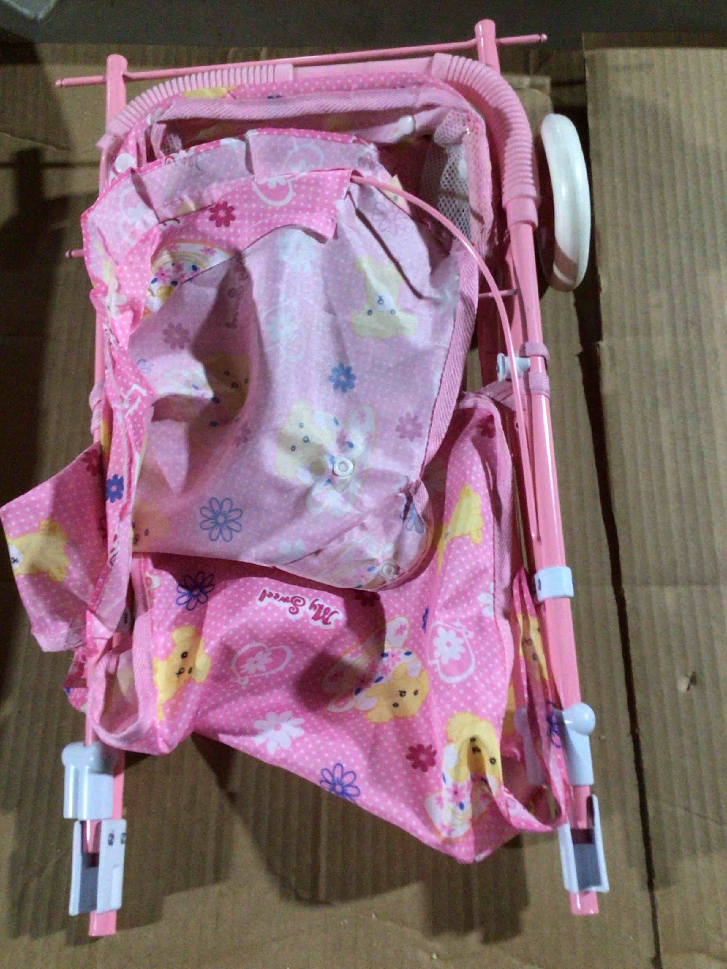 stroller or toy stroller for dolls.lt is designed with a pink folding frame