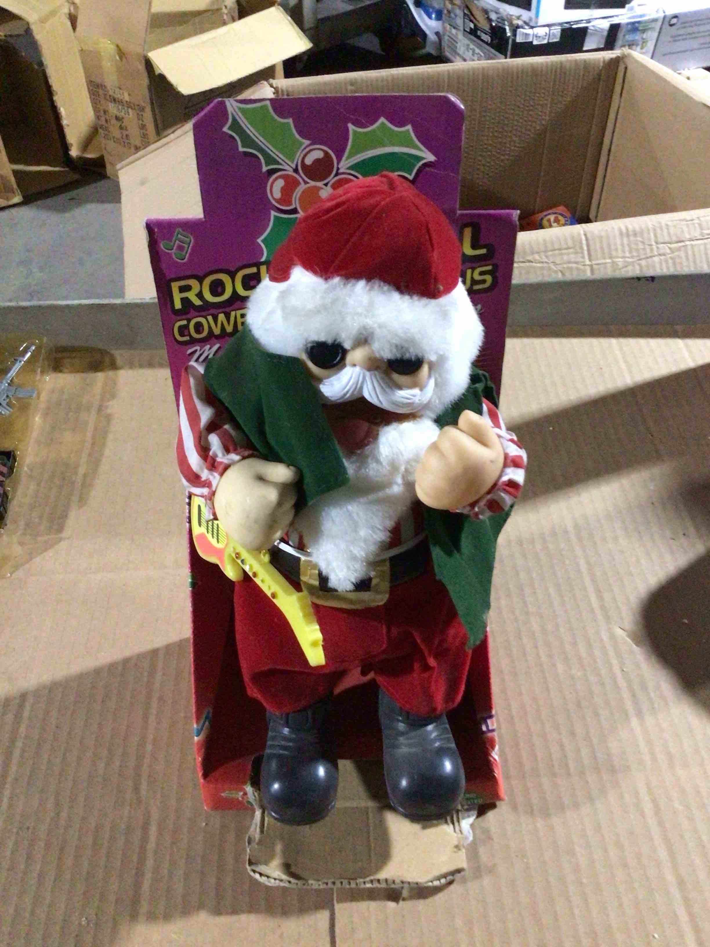 Condition photo showing As Is for santa’s musical and animated toy 