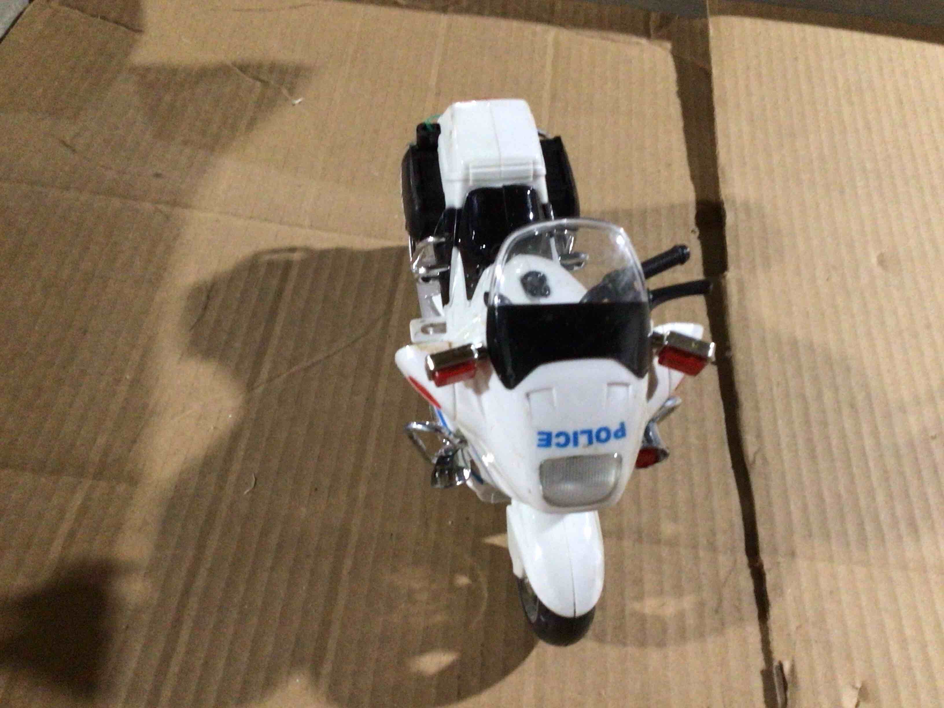 Condition photo showing As Is for Toy police motorcycle with crun and move forward action