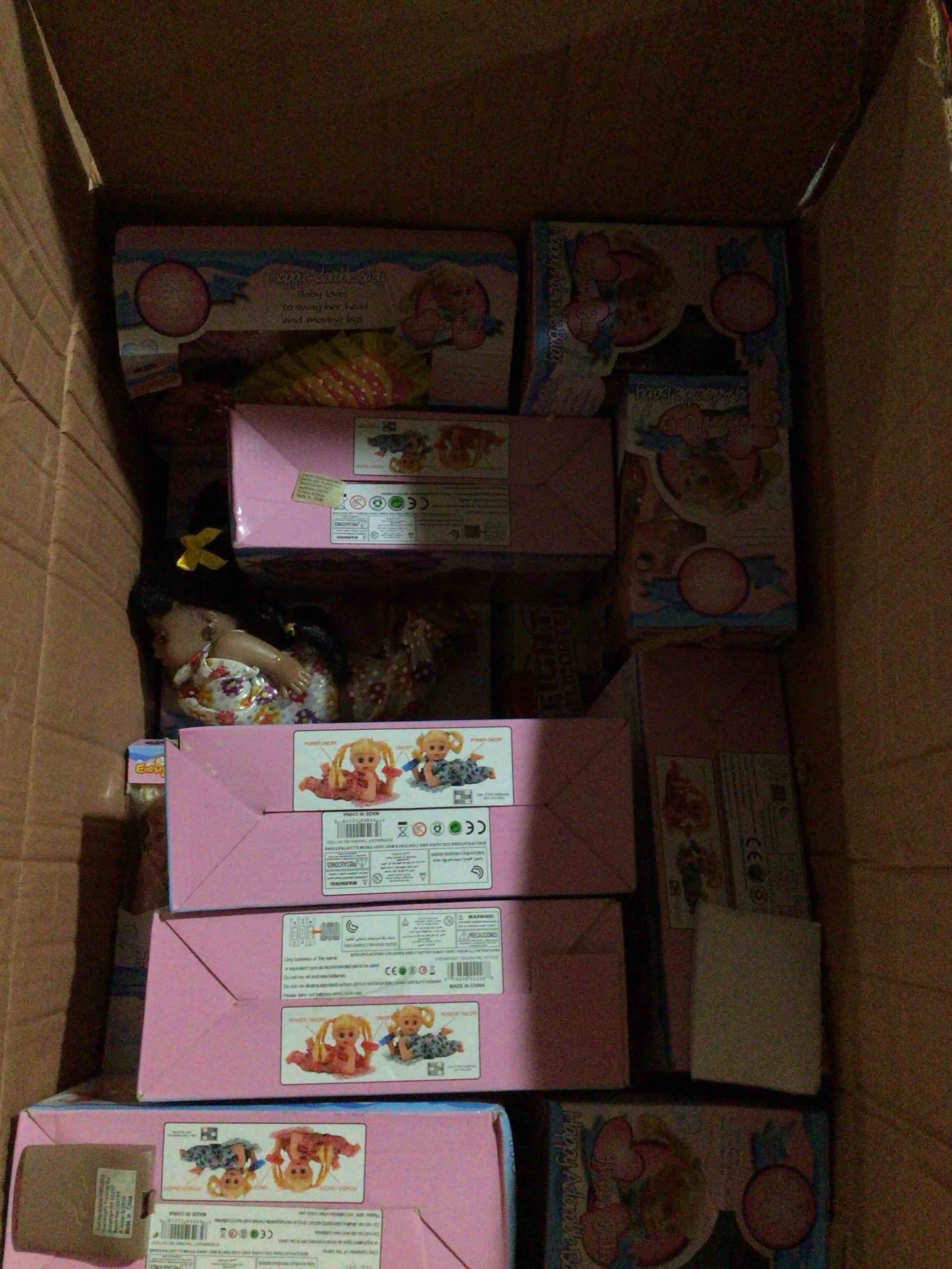 box of baby dolls