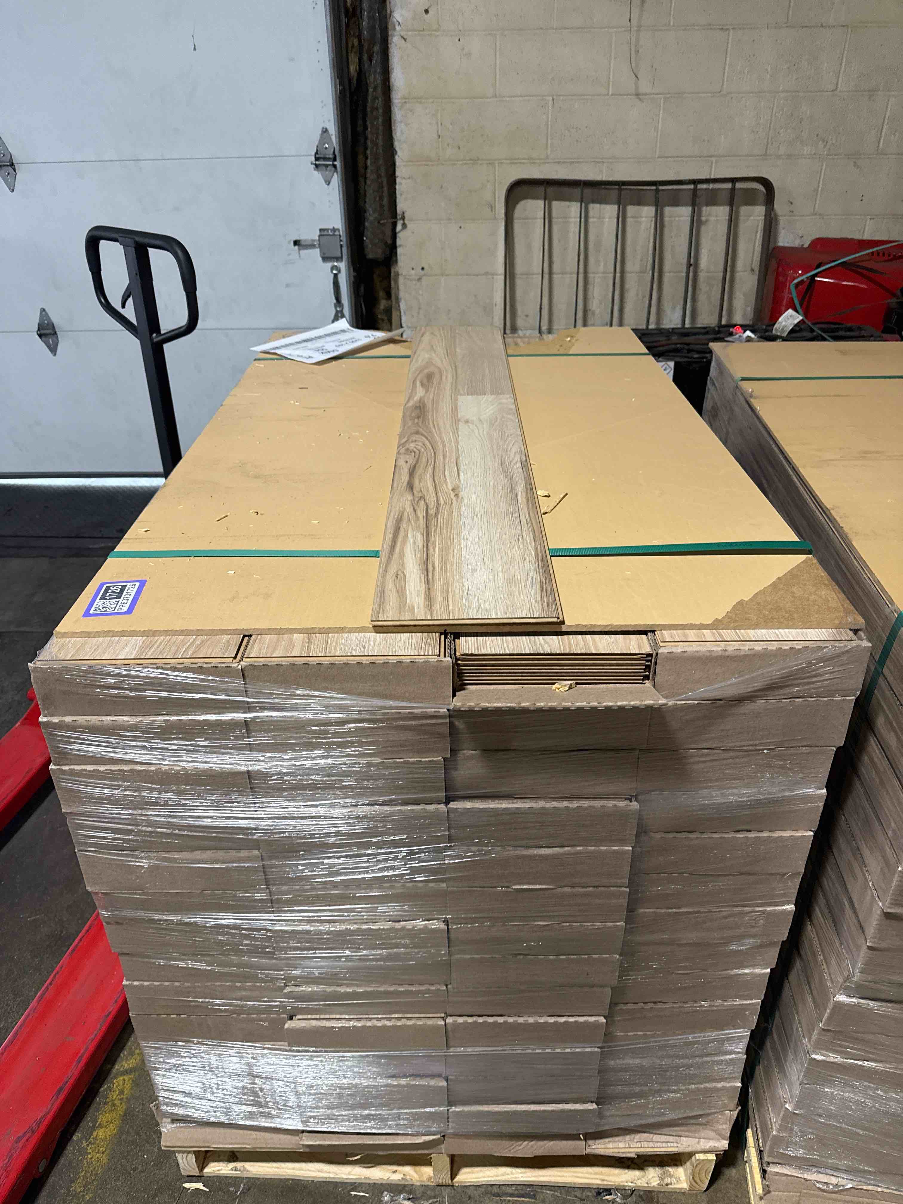 1376 sq ft of 7.75” x50.75” laminate flooring your bid per sq ft