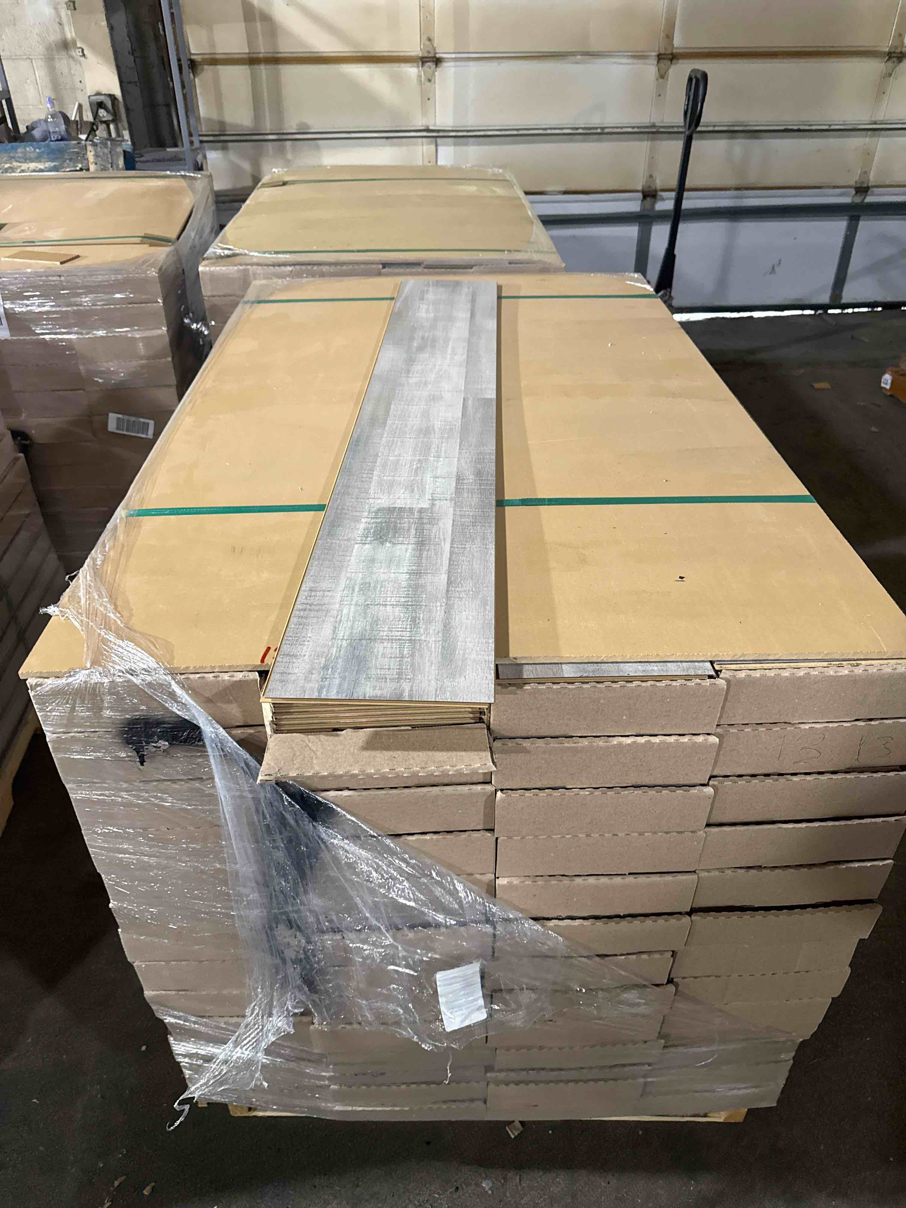 1376 sq ft of 7.75” x50.75” laminate flooring your bid per sq ft 