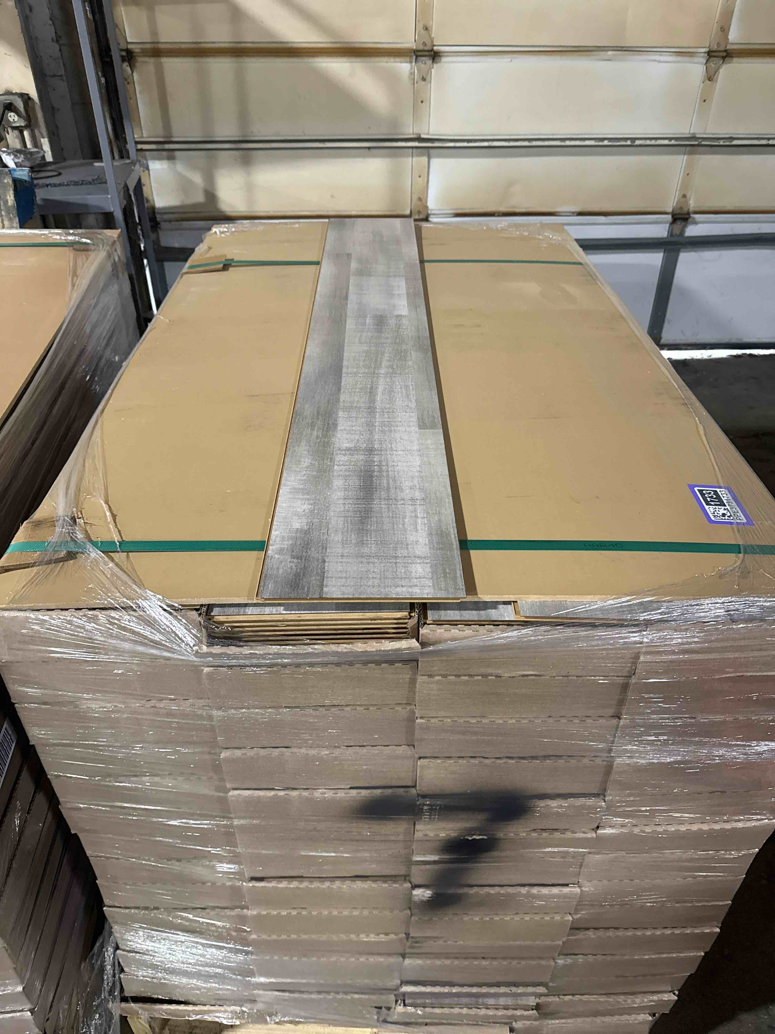 1376 sq ft of 7.75” x50.75” laminate flooring your bid per sq ft 