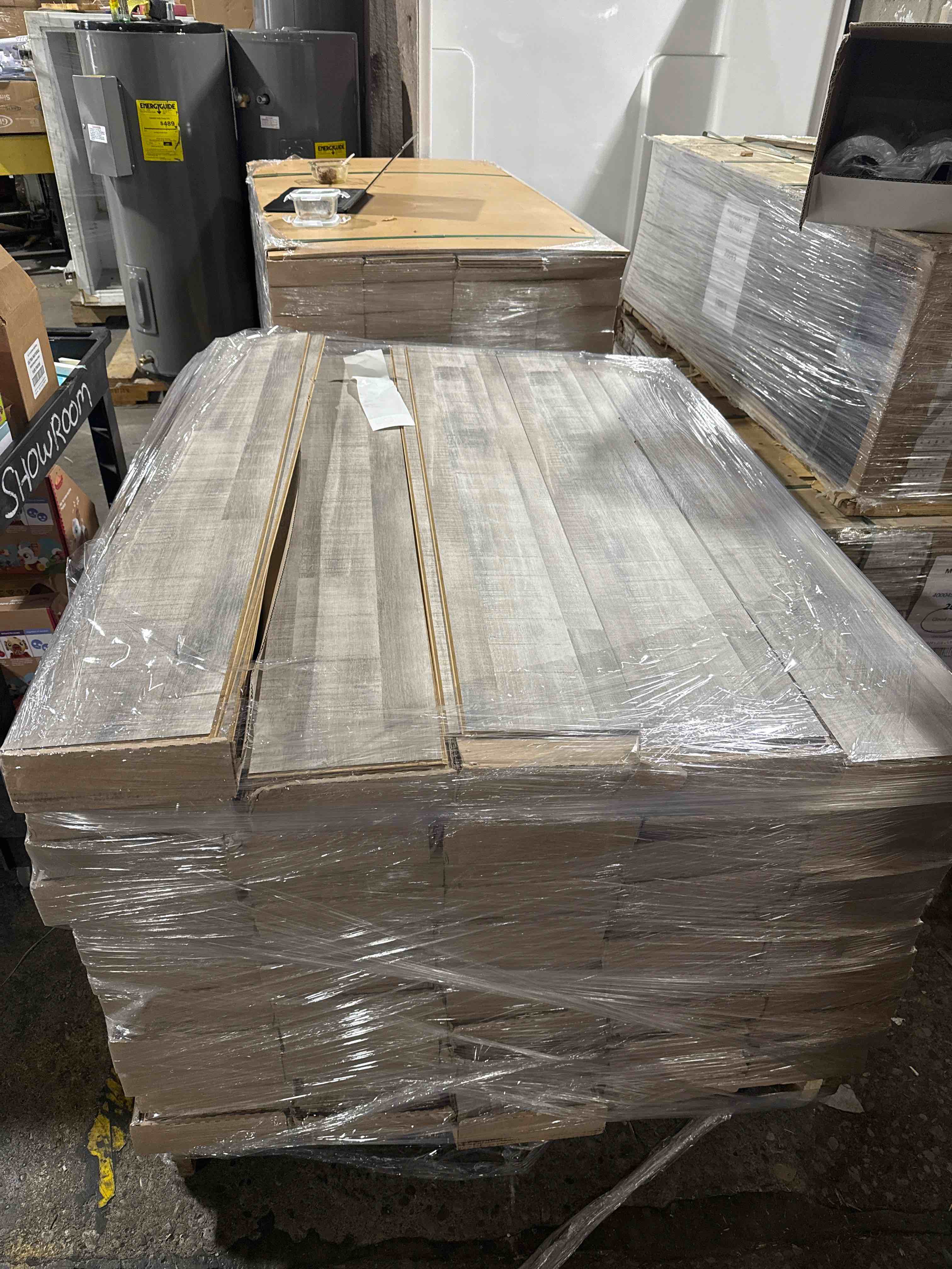 1376 sq ft of 7.75” x50.75” laminate flooring your bid per sq ft 