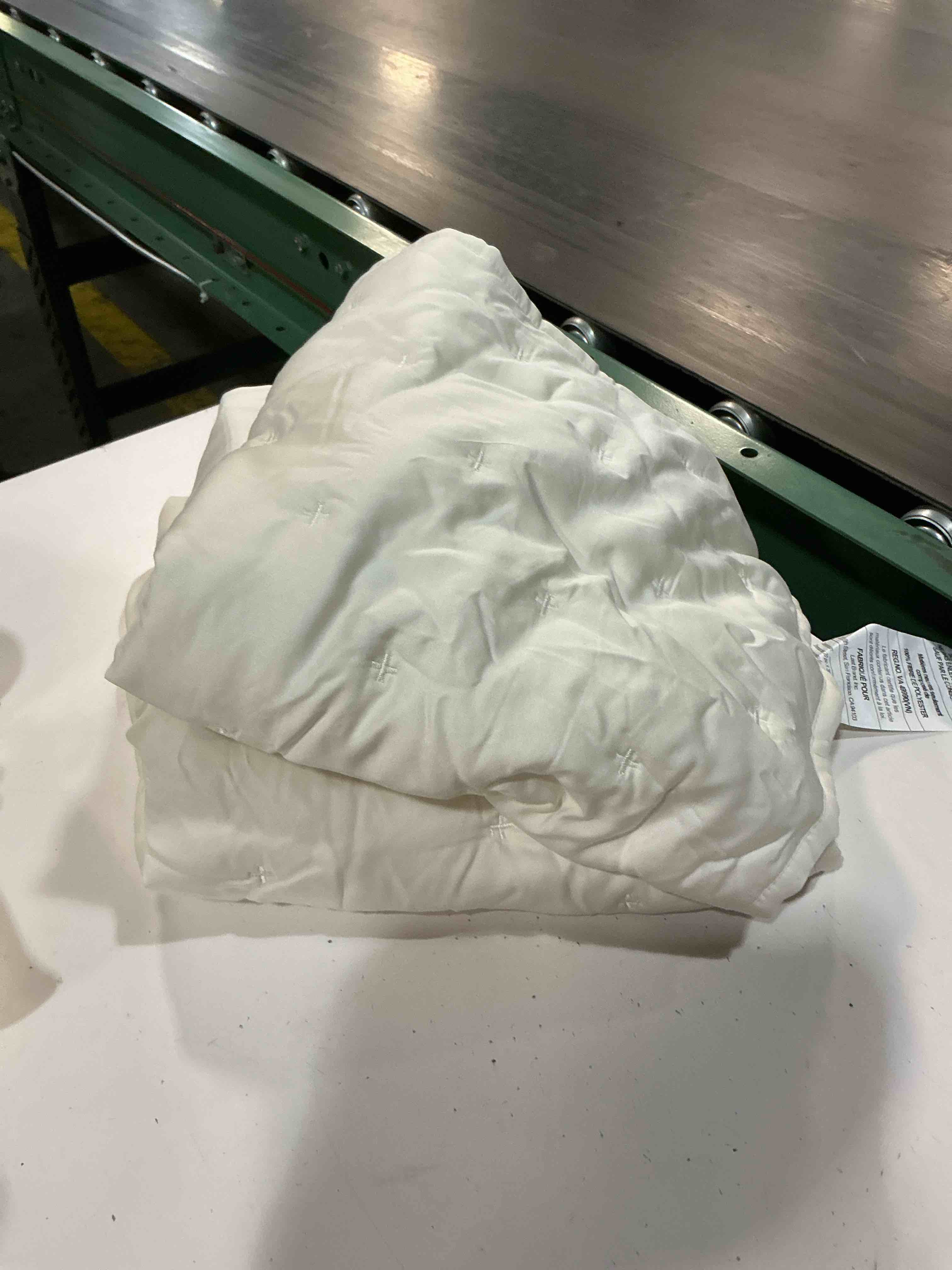 Condition photo showing As Is for quince (only 1 pieces) bamboo dream quilt set, king/cal king, ivory