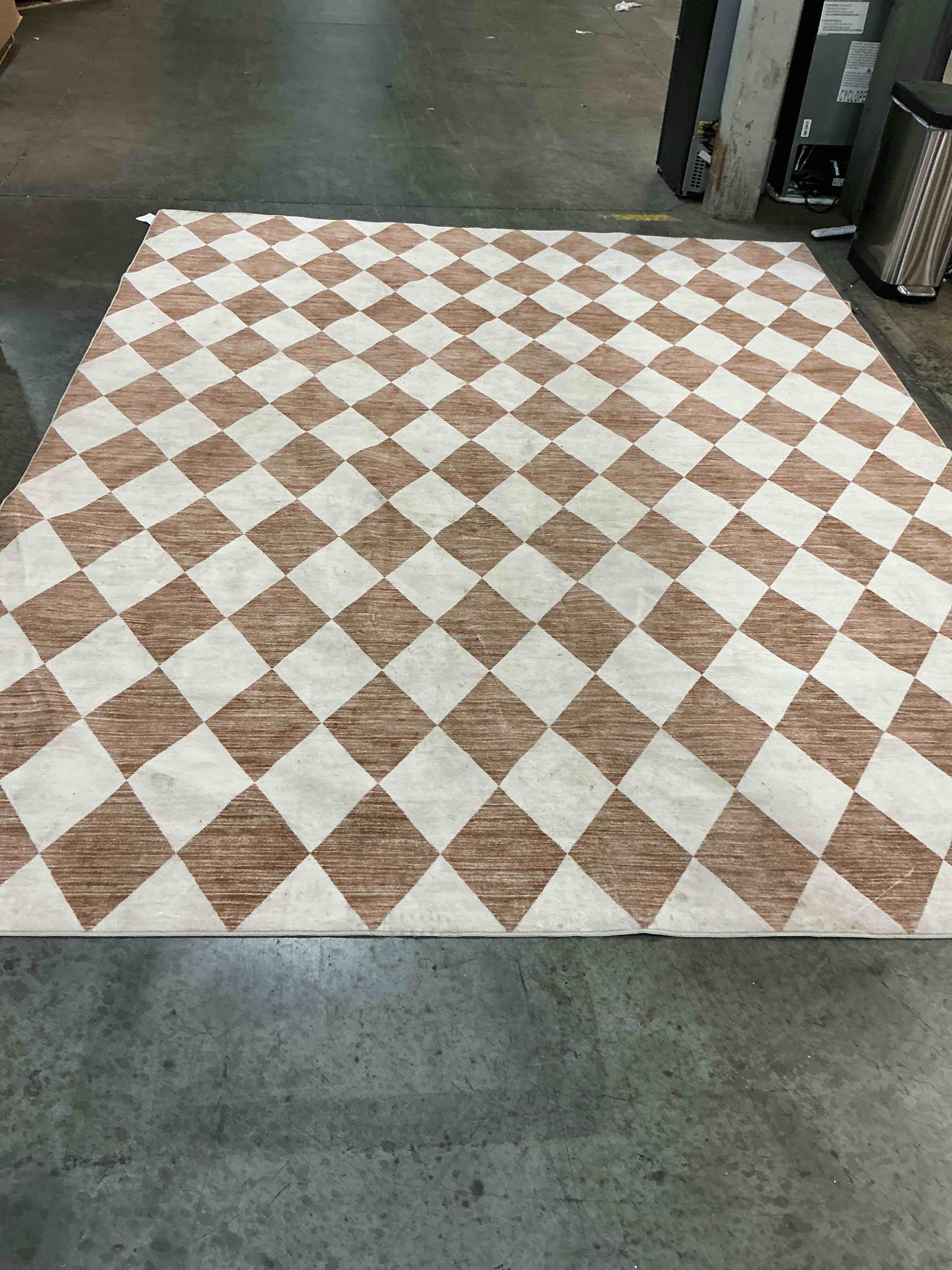 Condition photo showing As Is for nourison positano 8' x 10' beige diamond modern flatweave indoor/outdoor rug