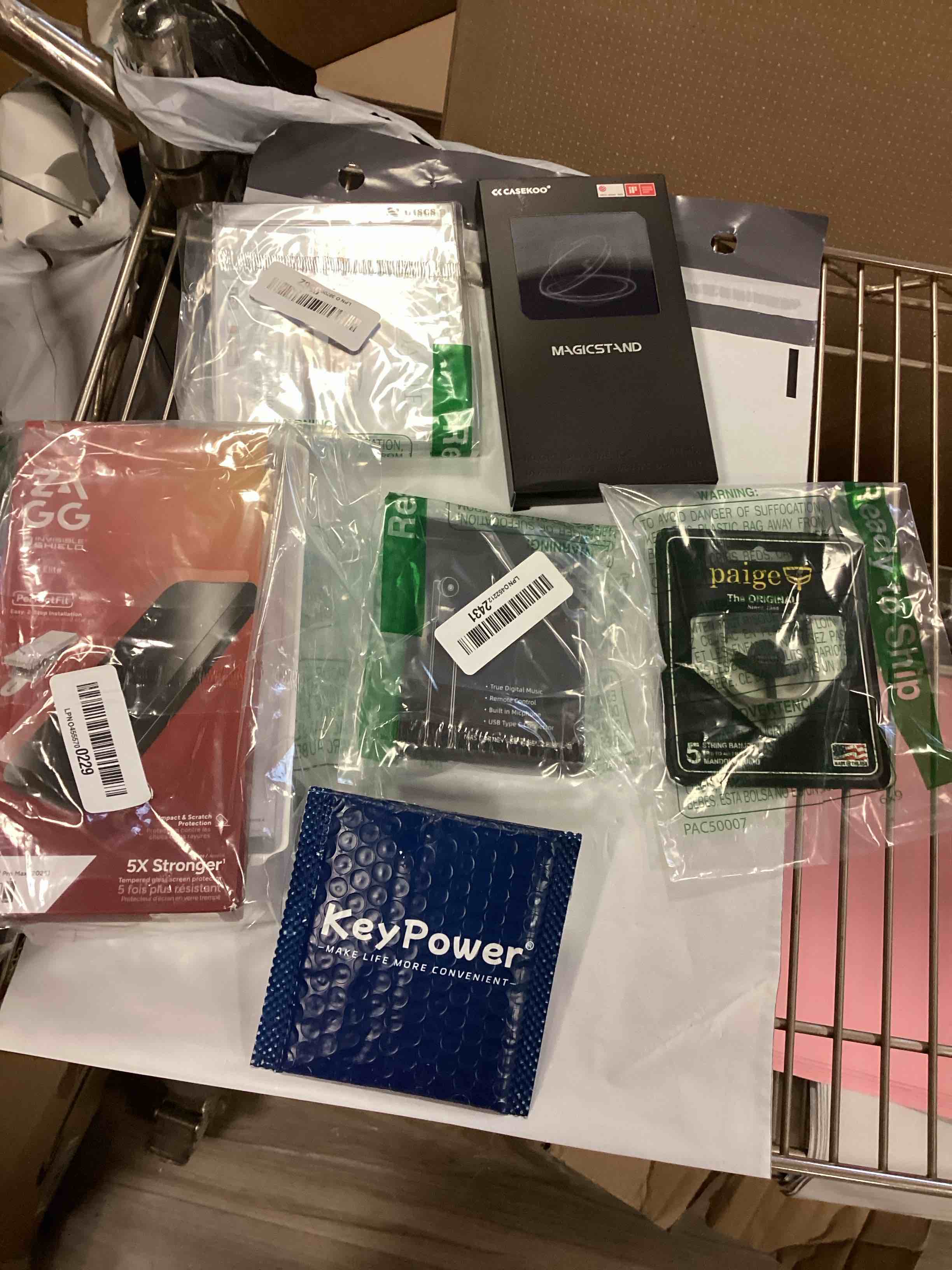 Assorted items , Phone protectors, headphones and more