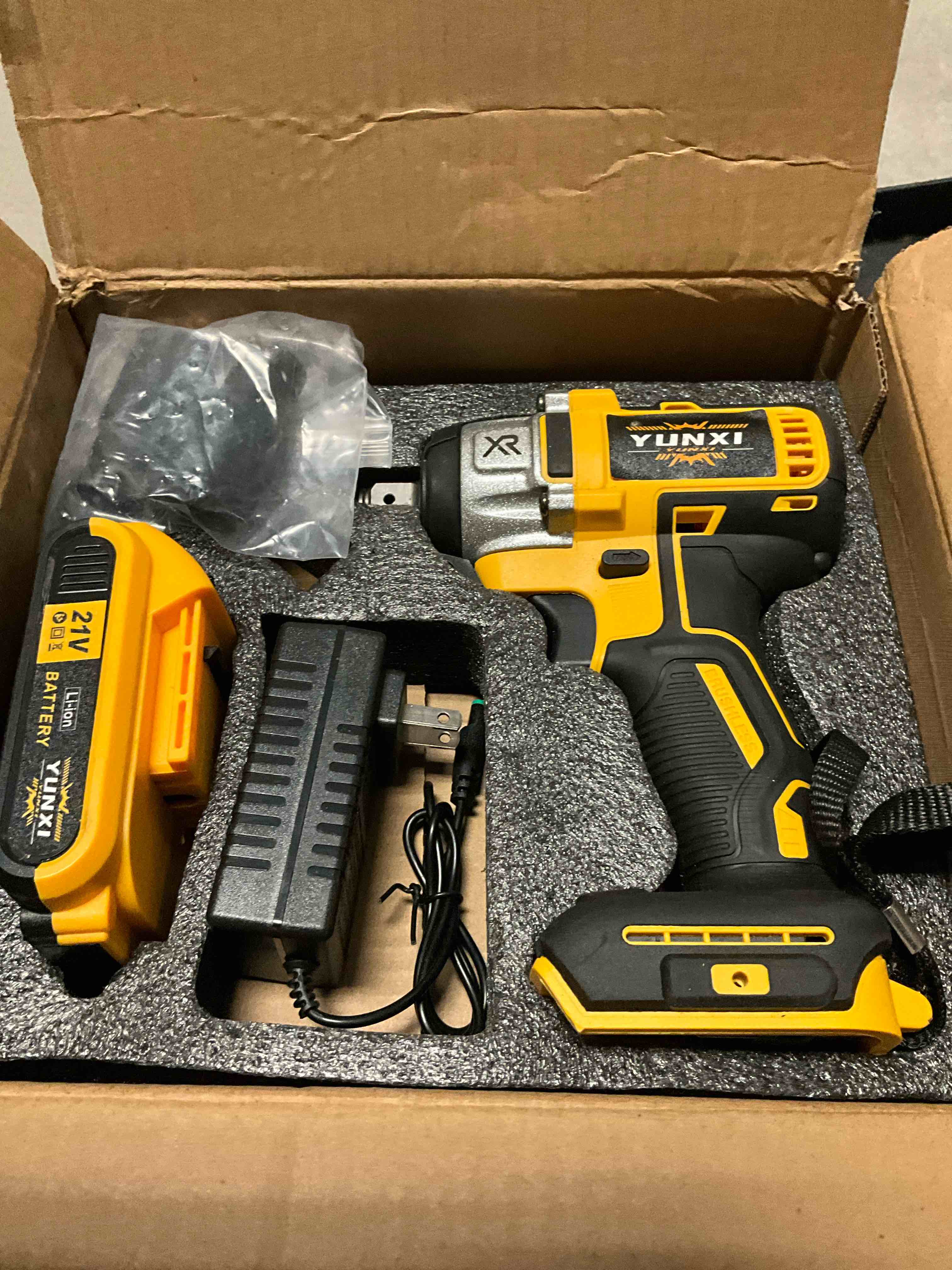 Yunxi Brushless Lithium Impact Wrench, Includes 1 Battery, Charger, 2 Sockets