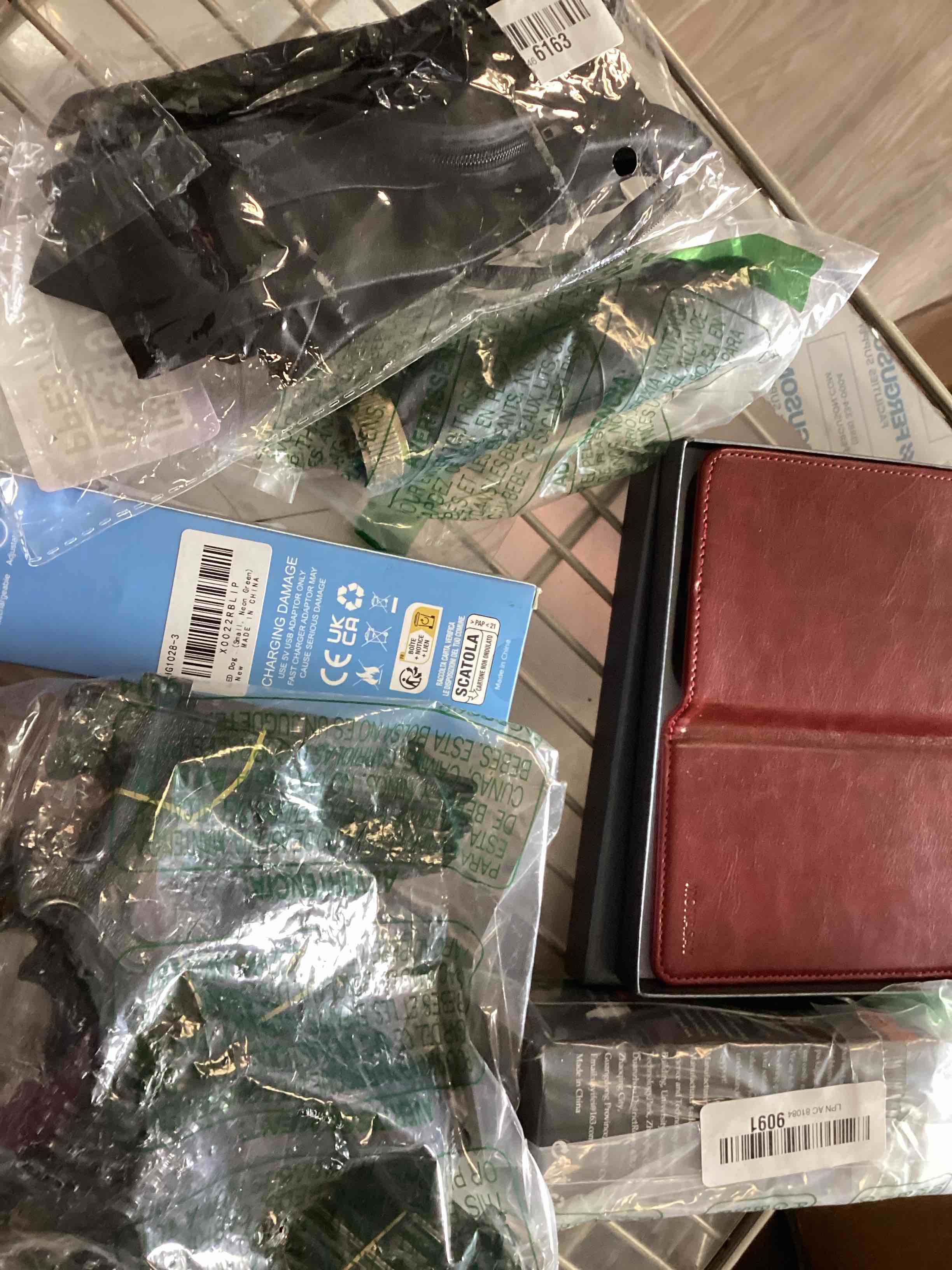 Assorted items Dog collar, phone case and more