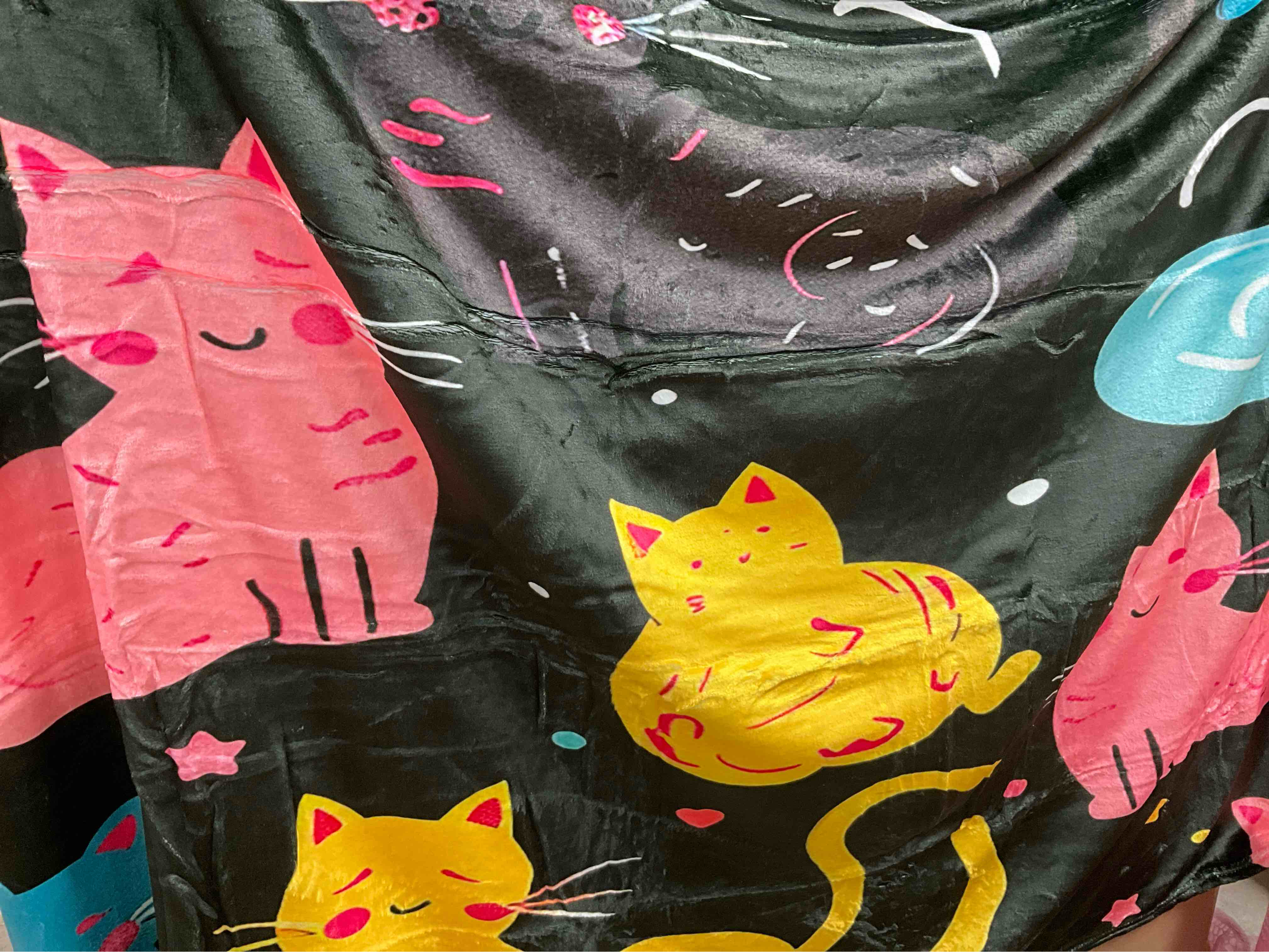 Black Satin Blanket With a Colorful Cat Pattern.