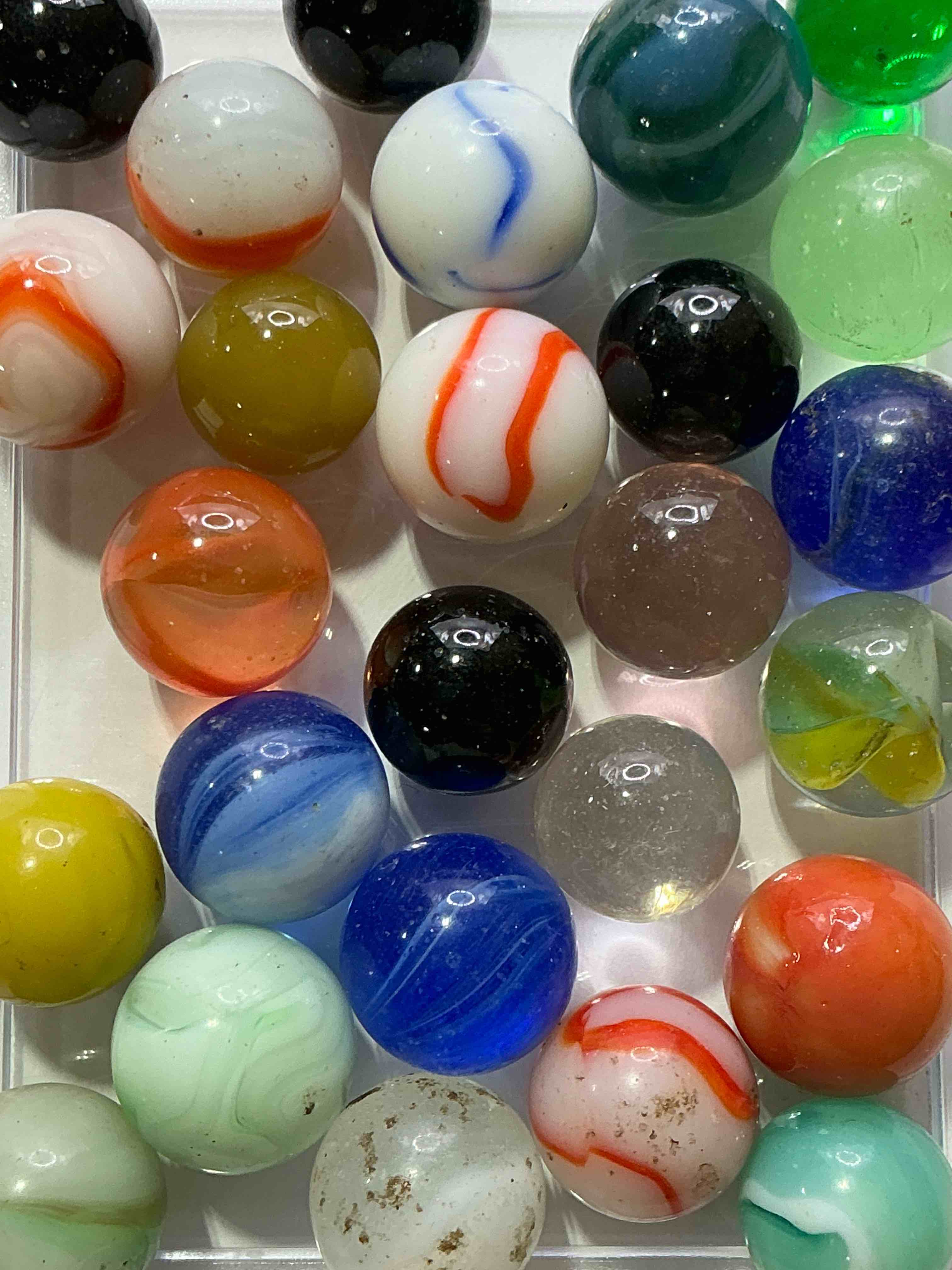 Condition photo showing Good Condition for antique glass marbles! genuine stunning marbles lot, all marbles made between the years 1925-1965 & made with uranium! many are great depression era & even earlier! gorgeous, authentic pieces of history!  